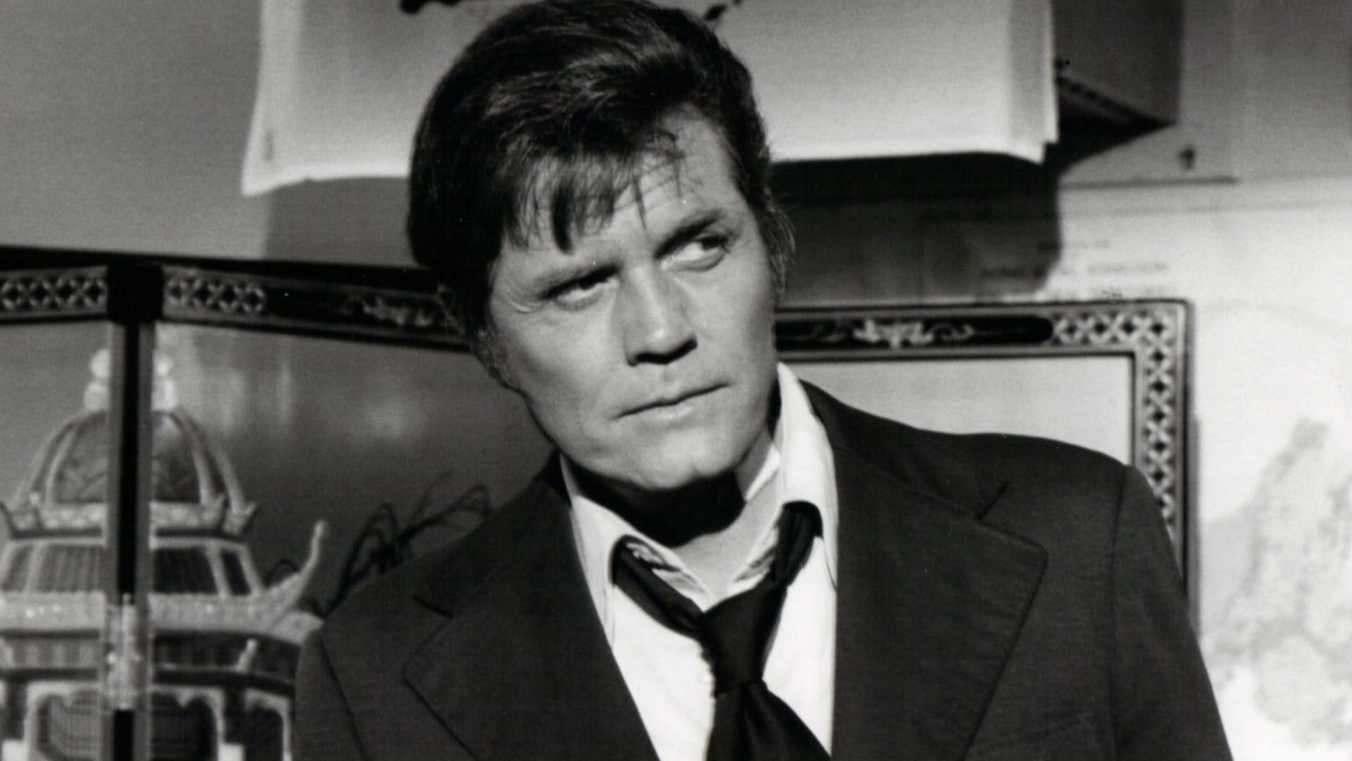 Photo of Jack Lord as Steve McGarrett from the television program Hawaii Five-O. This is the premiere episode of the show's ninth year, and the storyline is that McGarrett was pulled from the water in Hong Kong, suffering from amnesia and unable to recall