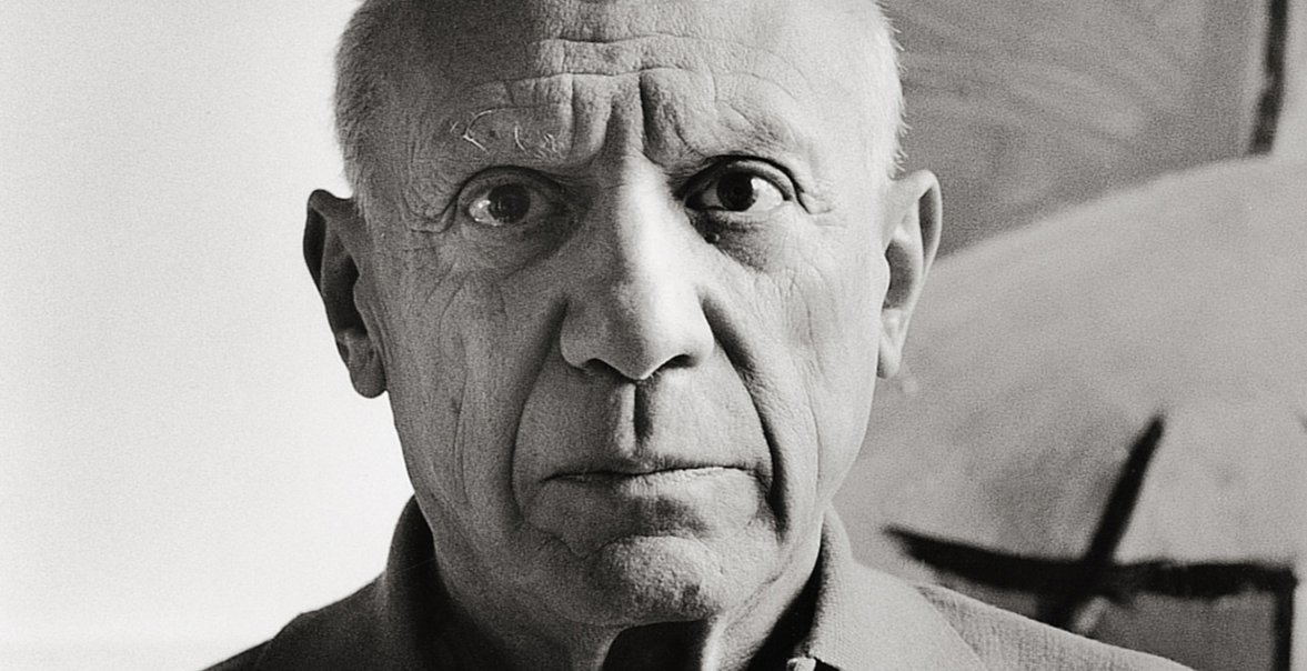Portrait of Pablo Picasso, looking stern.