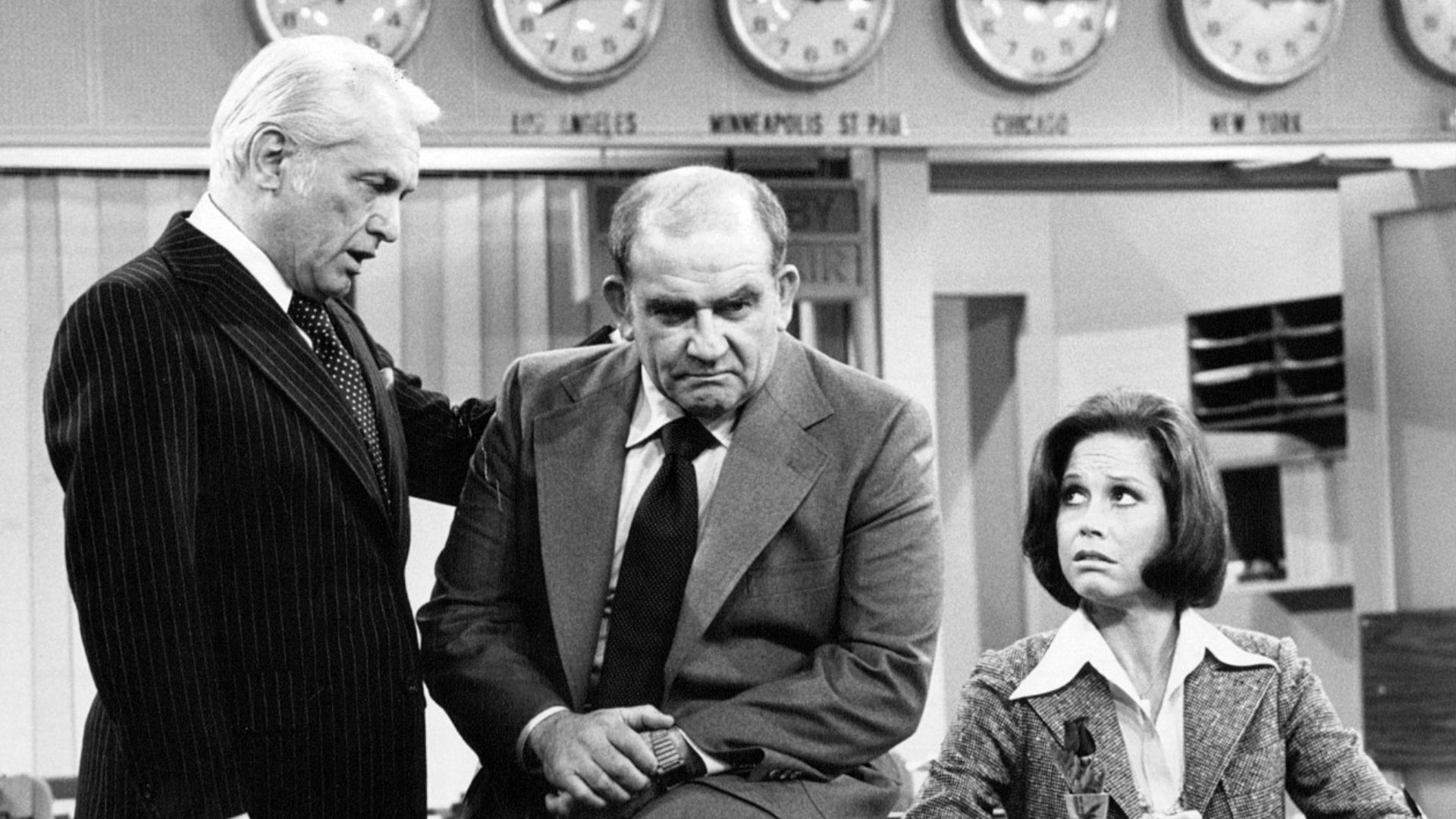 Photo of Ted Knight as Ted Baxter, Ed Asner as Lou Grant and Mary Tyler Moore as Mary Richards from the last episode of The Mary Tyler Moore Show-