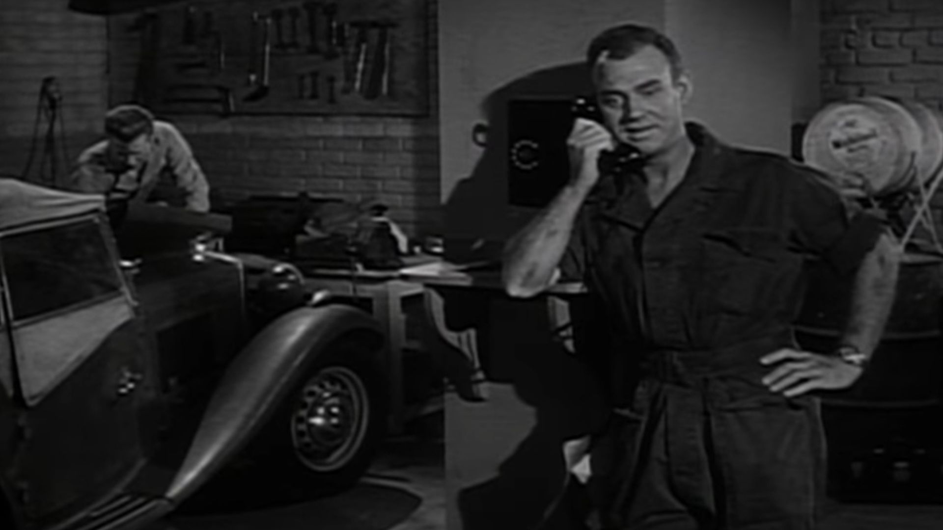 John Smith and Dabbs Greer in Hot Rod Girl. This film is in the public domain now.