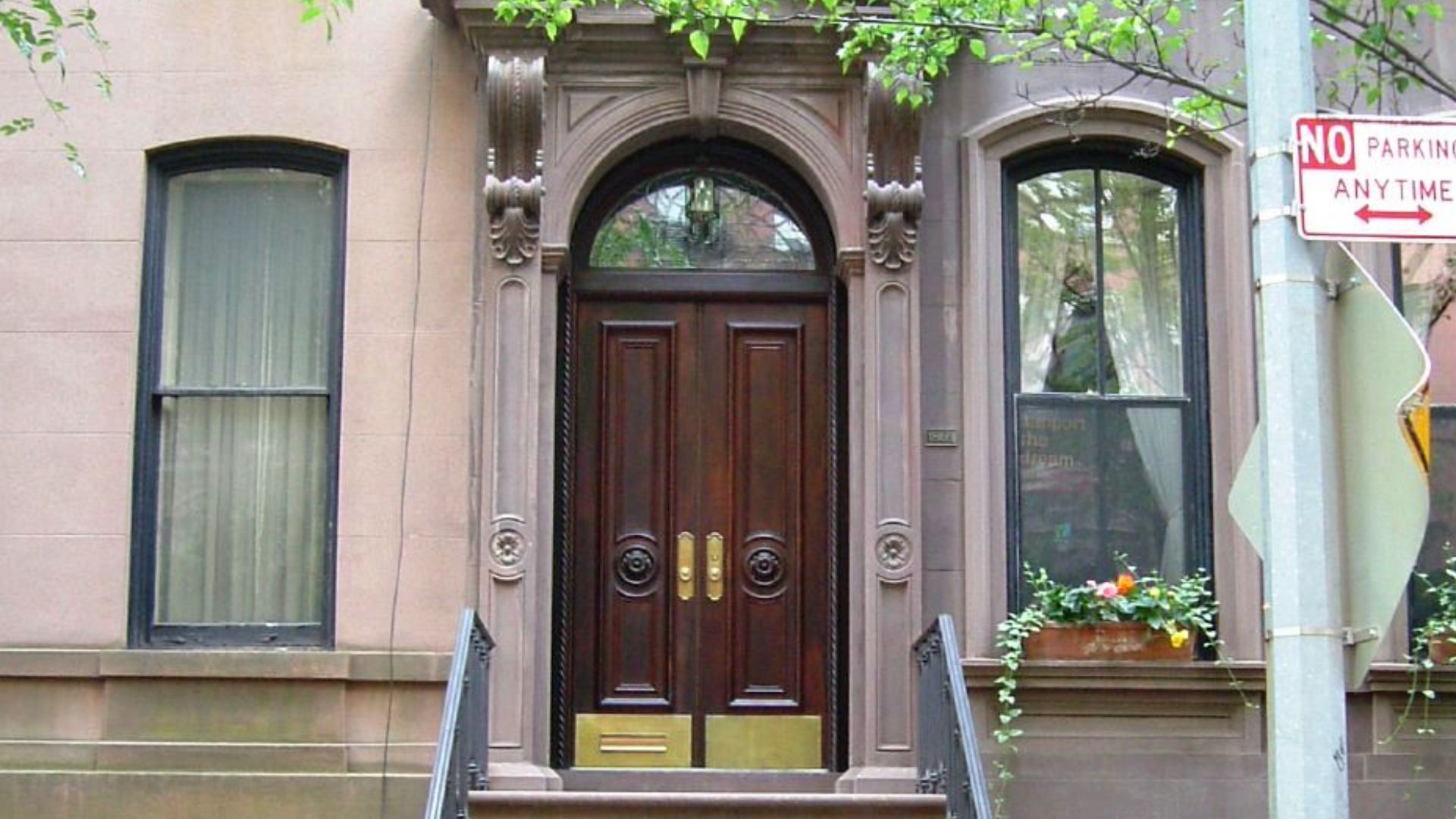 The building used for the exterior of Carrie Bradshaw's House in Sex and the City, 66 Perry Street between Bleecker and West 4th Streets in the West Village neighborhood of Greenwich Village, Manhattan, New York City, was built c.1899, and is located in t
