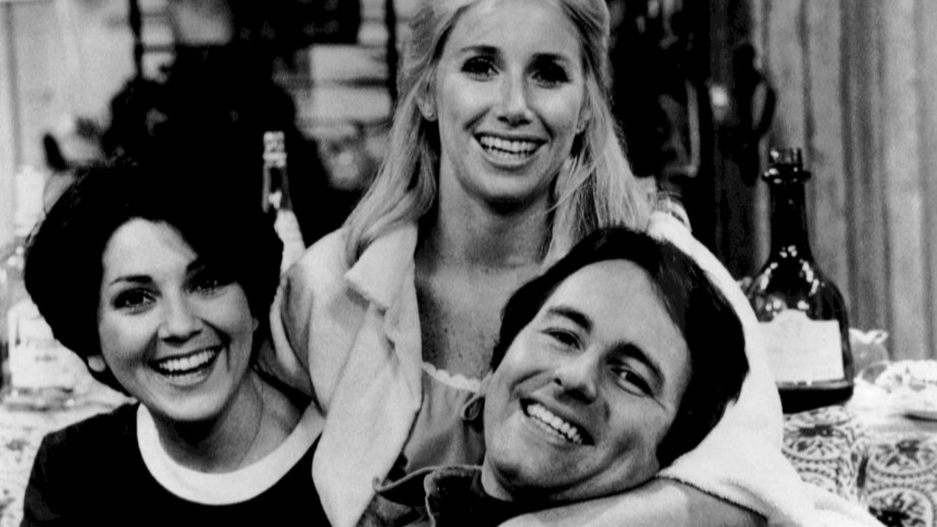 Publicity photo of the roommates from the television program Three's Company.  From left: Joyce DeWitt (Janet}, Suzanne Sommers (Chrissy), John Ritter (Jack).