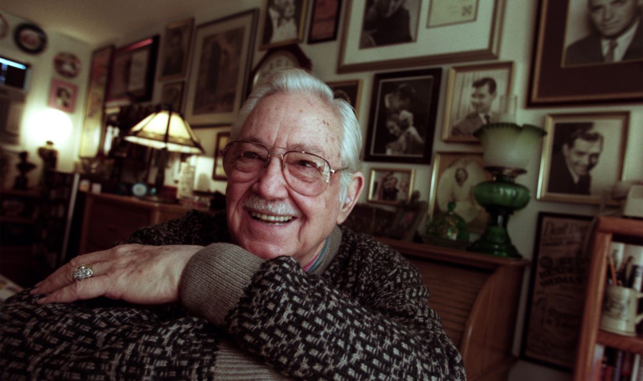 Getty Images - 569125805 - Hal Riddle, 80, a retired actor, reflects on his career while in his cottage at the Motion Picture and Television Country Home in Calabasas. His walls are filled with pictures of stars in the business. One of the stars he especially admired was Clark Gable.