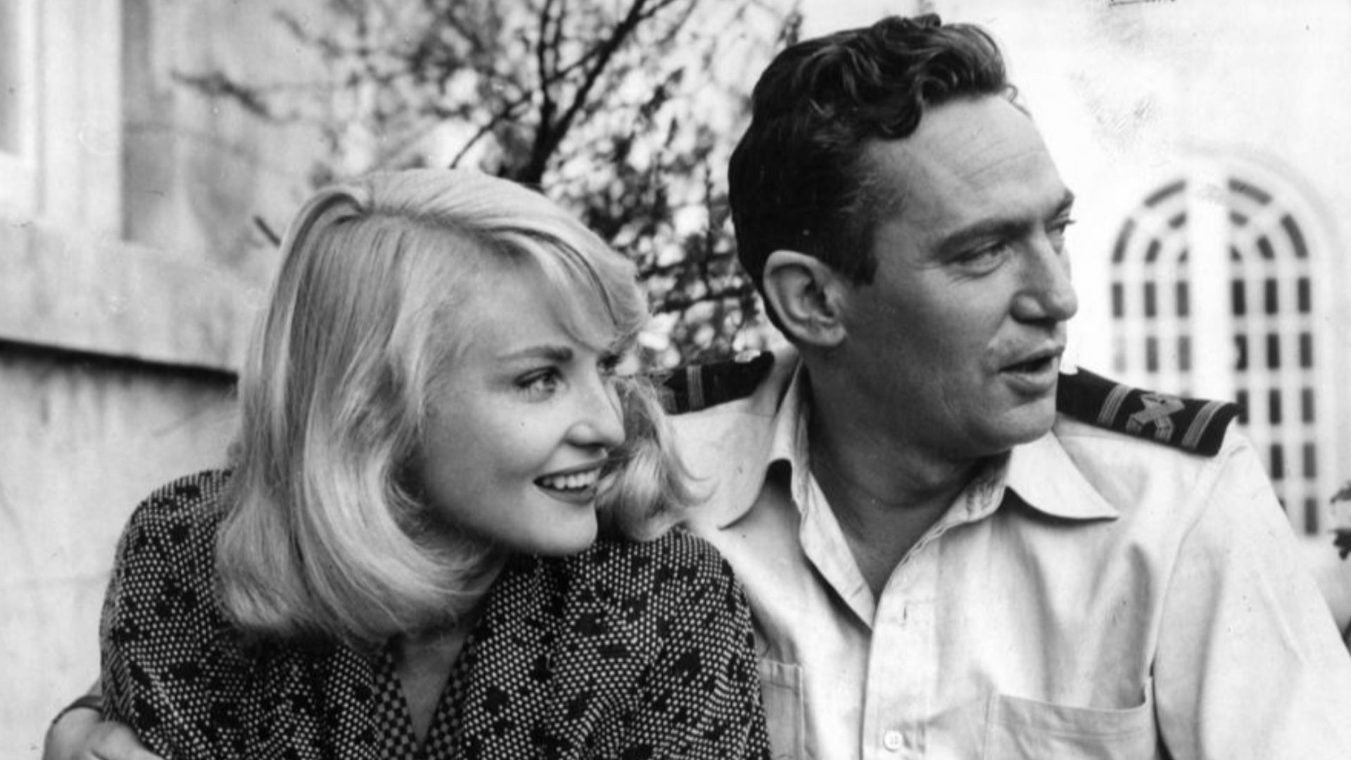 Diane Cilento with Peter Finch. Photographed in London during the making of the film 'Passage Home' (released in 1955).