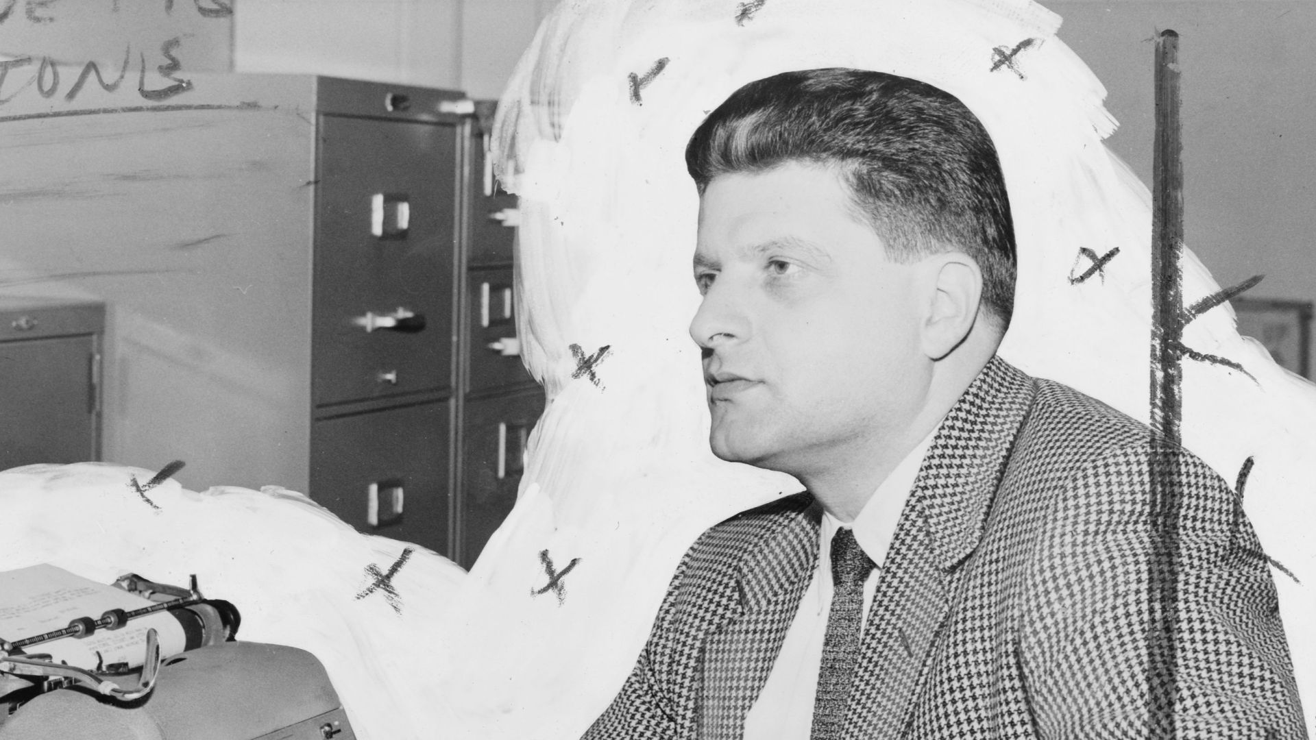 Paddy Chayefsky, half-length portrait, seated at typewriter, facing left / World-Telegram photo by Walter Albertin.