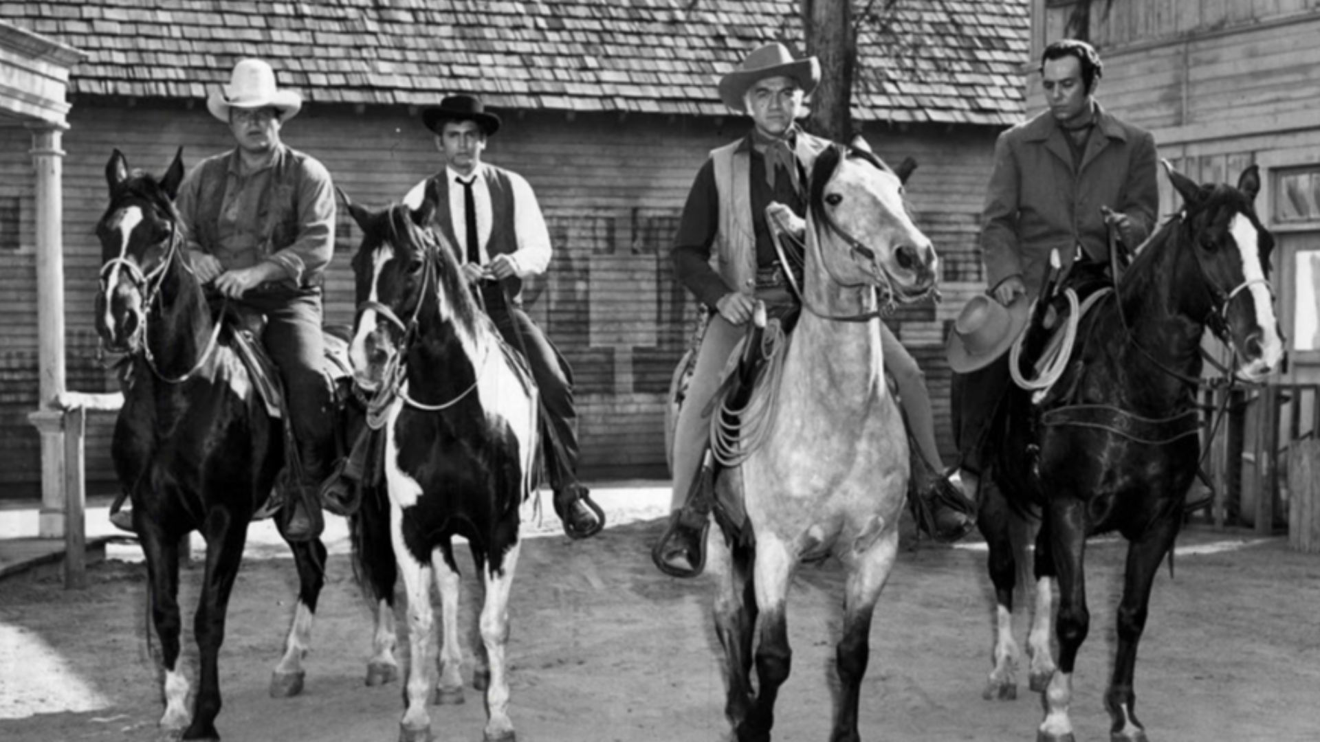 Photo of the main cast of Bonanza.  From left: Dan Blocker (Hoss), Michael Landon (Little Joe), Lorne Greene (Ben), Pernell Roberts (Adam).