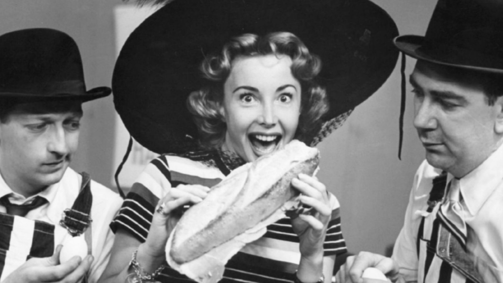 Photo of Ray Goulding, Audrey Meadows and Bob Elliott.  The men were known as the comedy team of Bob and Ray; this was an early television show they hosted.