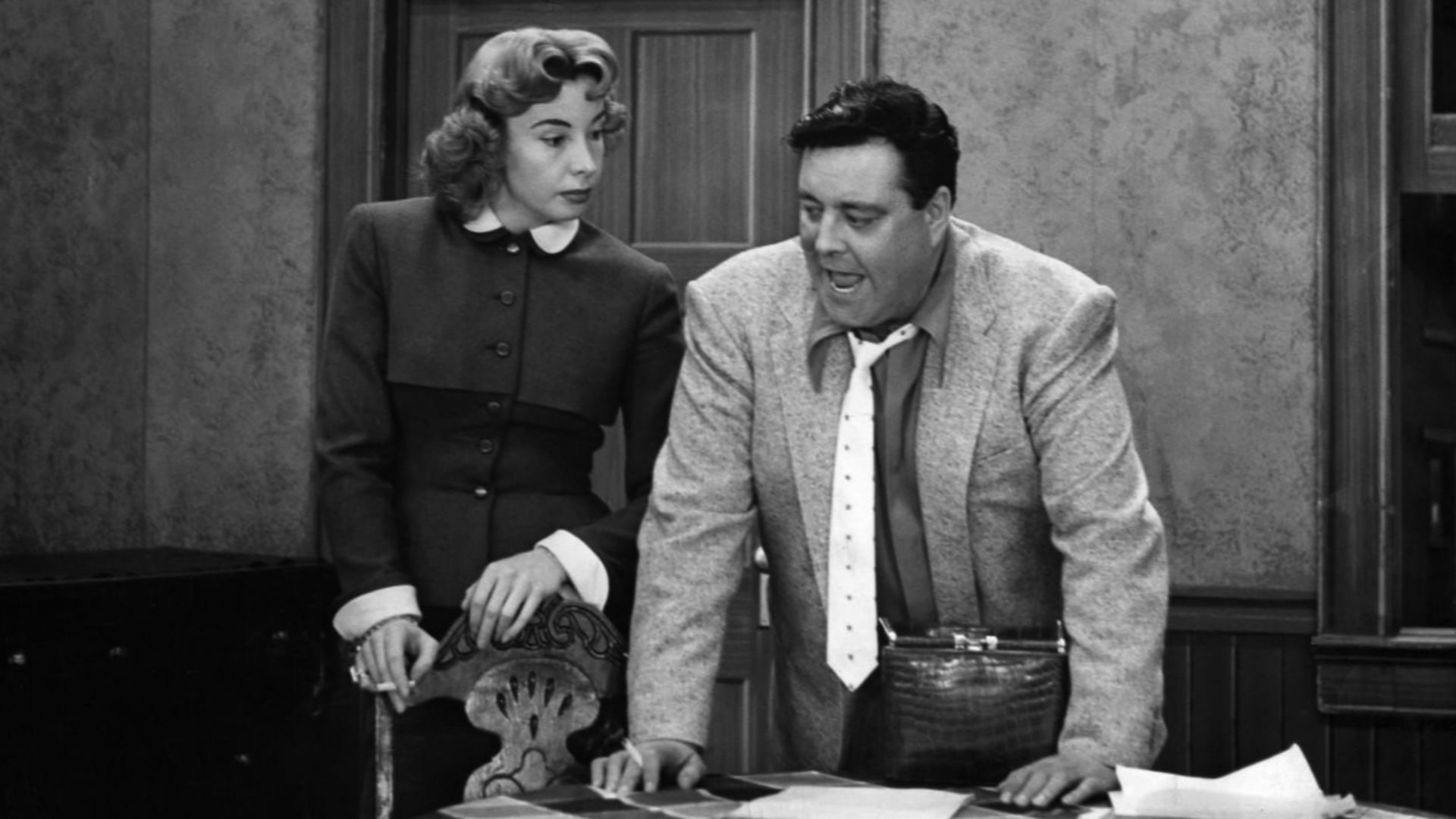 Photo of Audrey Meadows and Jackie Gleason as Ralph and Alice Kramden from the television program The Honeymooners.