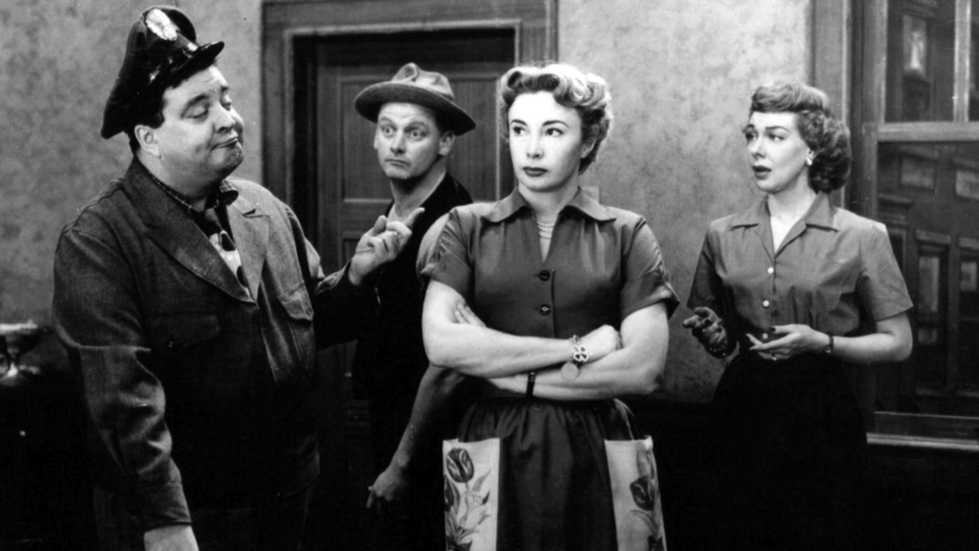 Photo of the full cast of The Honeymooners.  From left-Jackie Gleason (Ralph Kramden), Art Carney (Ed Norton), Audrey Meadows (Alice Kramden), Joyce Randolph (Trixie Norton).