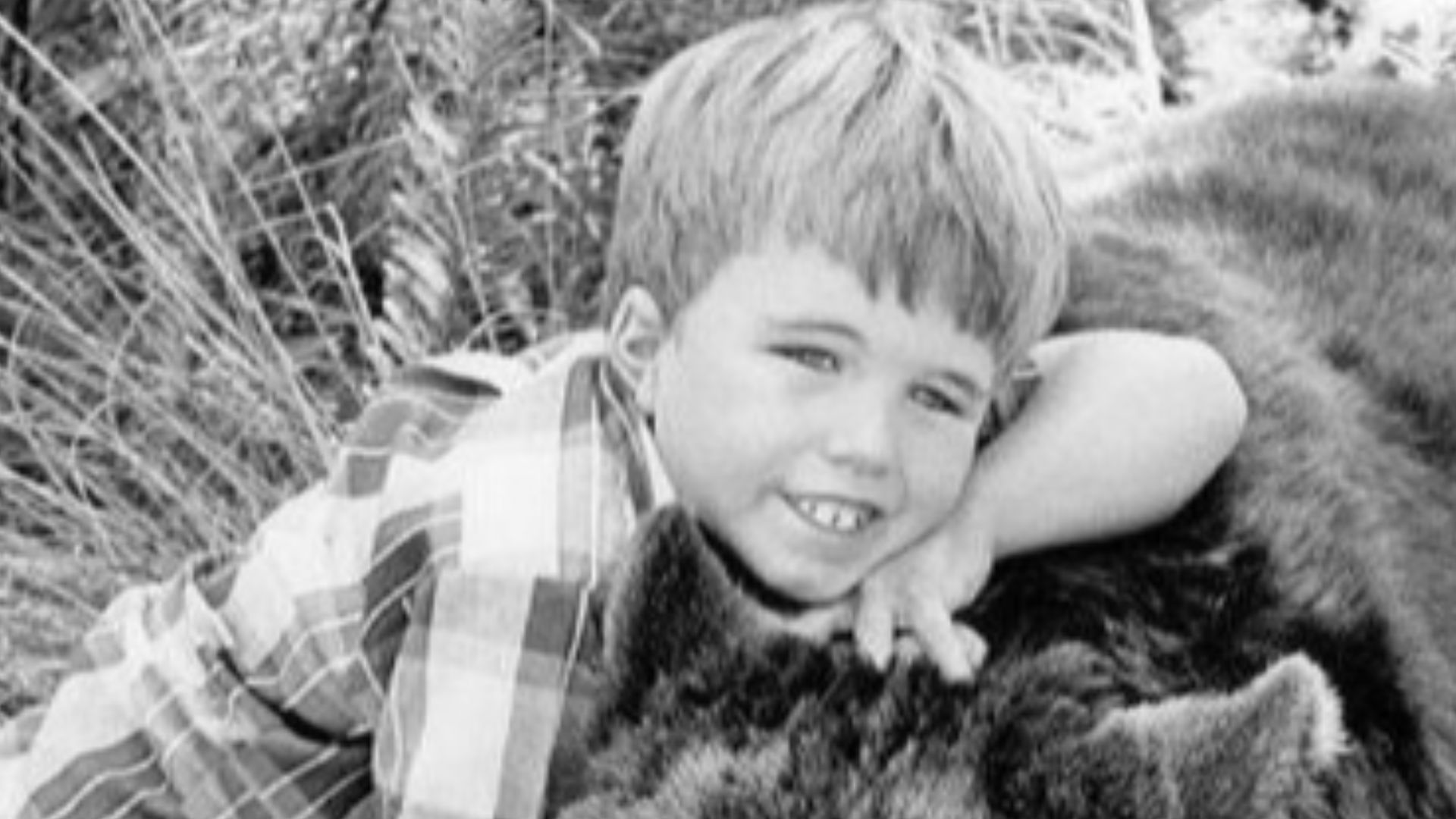 Photo of Clint Howard and Bruno the Bear from the television program Gentle Ben. This is from the series premiere.
