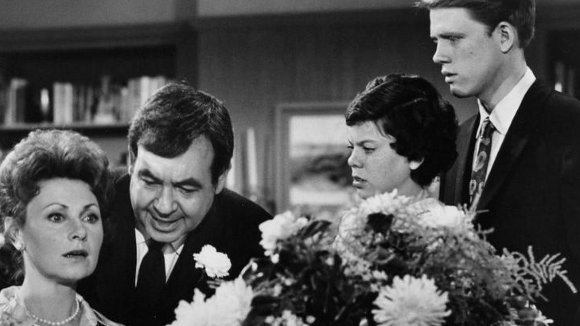 Photo of the Cunningham family from the television program Happy Days.  Pictured are Marion Ross (Mrs. Cunningham), Tom Bosley (Mr. Cunningham), Erin Moran (Joanie Cunningham) and Ron Howard (Richie Cunningham).