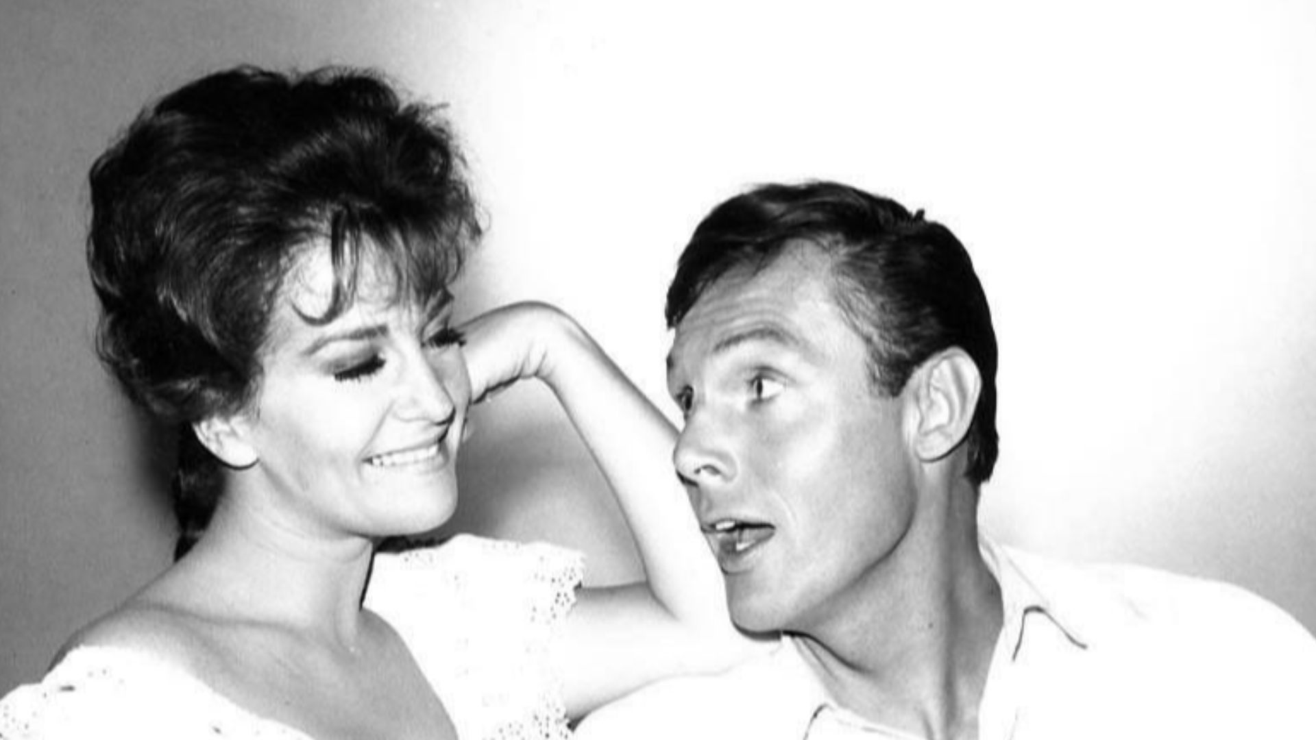 Photo of Adam West as Steve Nelson and Anita Sands in a 1961 scene from the television show Robert Taylor's The Detectives.