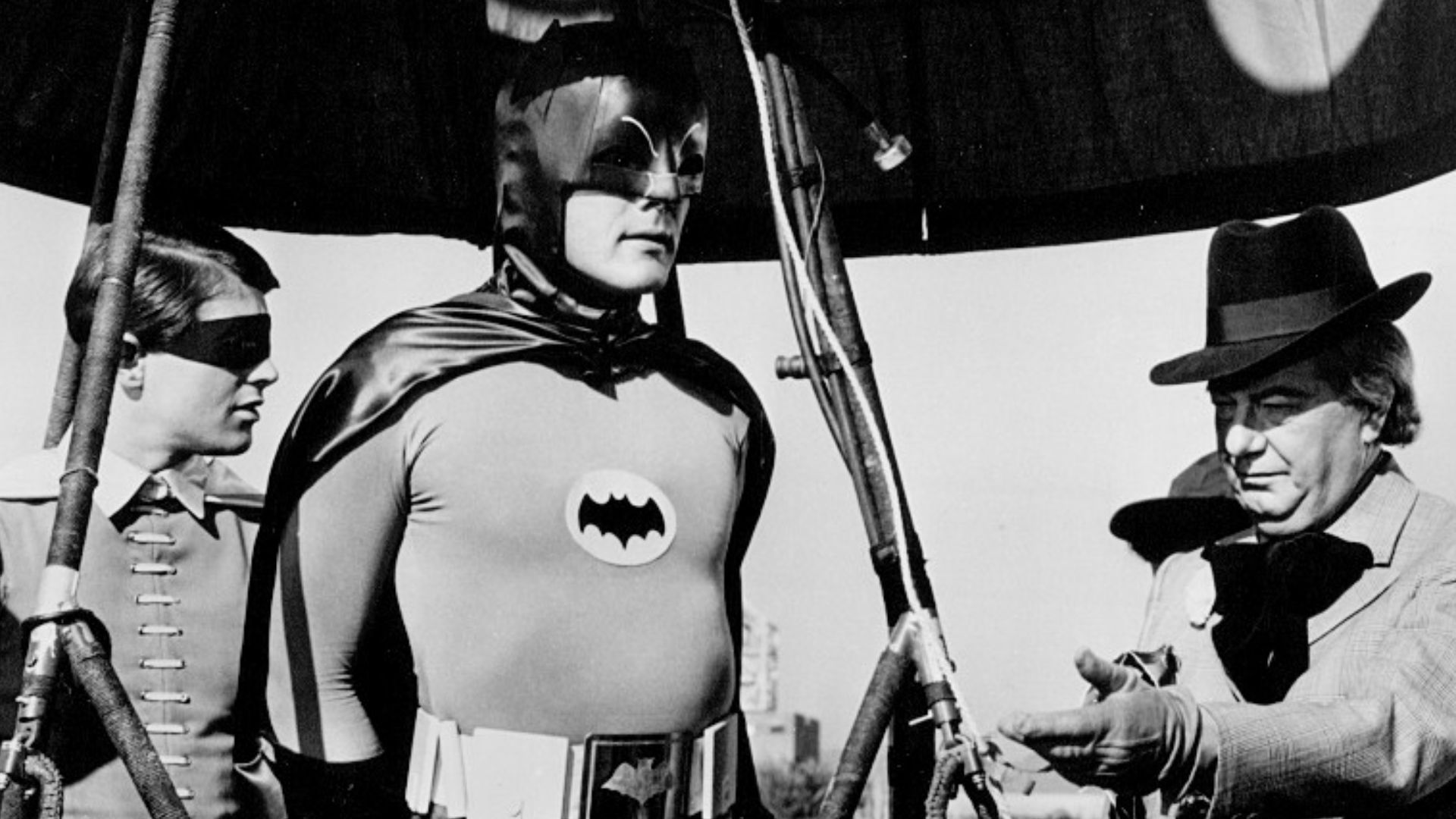 Photo of Burt Ward as Robin, Adam West as Batman and Maurice Evans as The Puzzler from the television series Batman.  This episode is