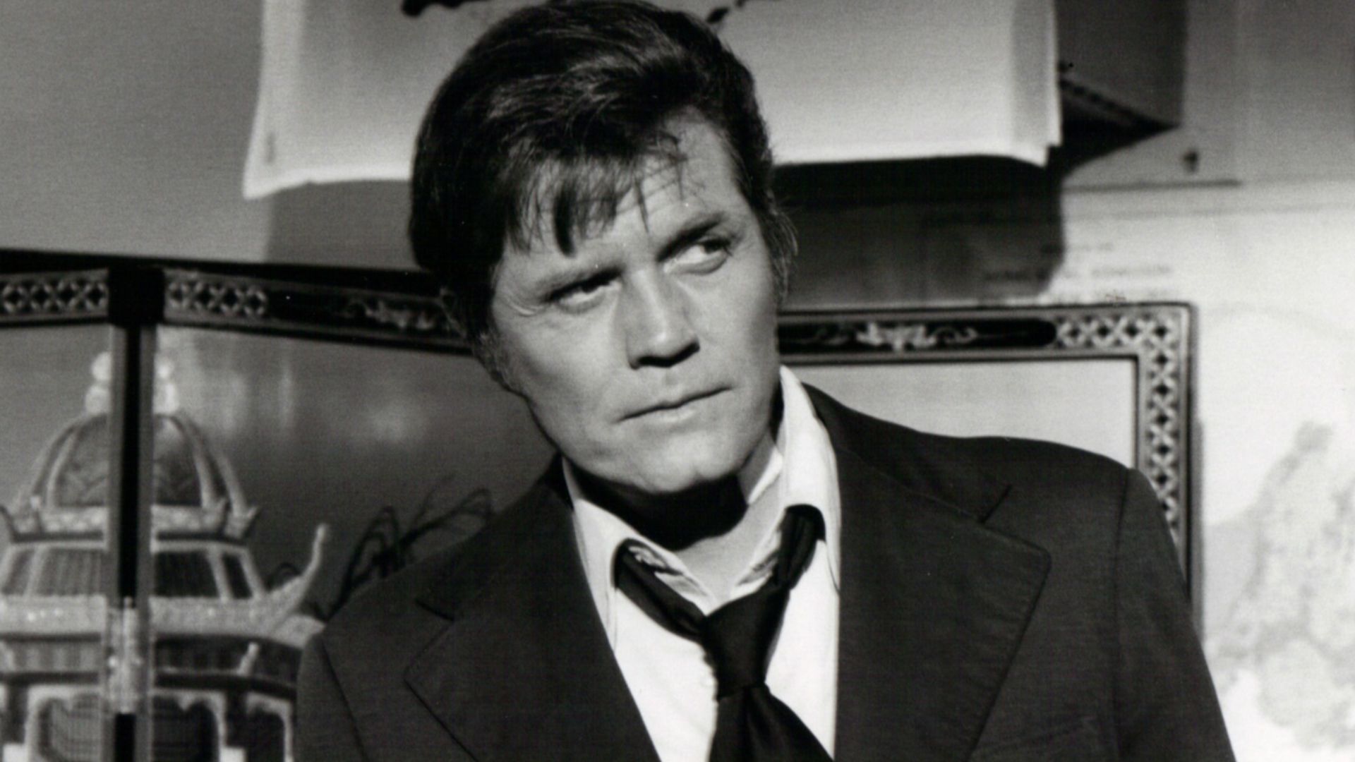 Photo of Jack Lord as Steve McGarrett from the television program Hawaii Five-O. This is the premiere episode of the show's ninth year, and the storyline is that McGarrett was pulled from the water in Hong Kong, suffering from amnesia and unable to recall