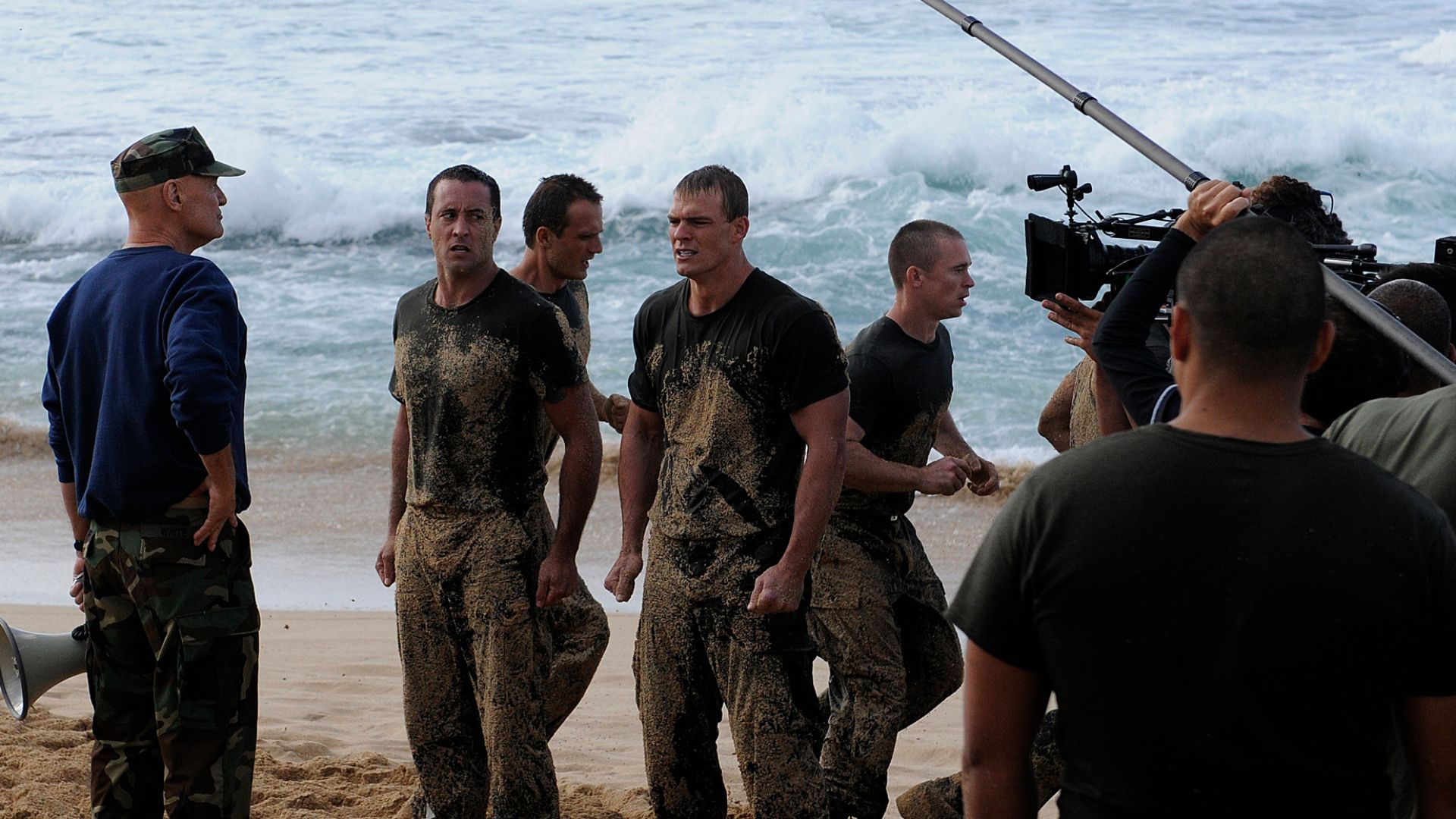 U.S. sailors assigned to Joint Base Pearl Harbor-Hickam, Hawaii, pose for a photo with cast members of the CBS television series 'Hawaii Five-0' after filming a scene for the show March 1, 2013, in Haleiwa, Hawaii. The episode was scheduled to air April 1