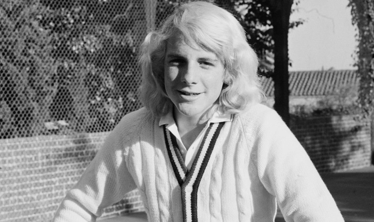 American actor and filmmaker Darby Hinton poses in tennis wear on a tennis court, United States, circa 1978. 
