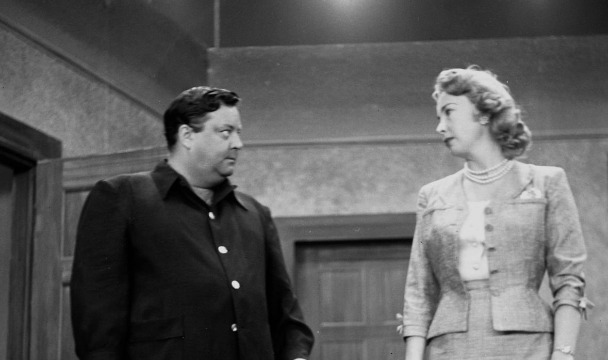LOS ANGELES - MAY 15, 1955: Actress Audrey Meadows and actor Jackie Gleason on stage during the rehearsal of the 
