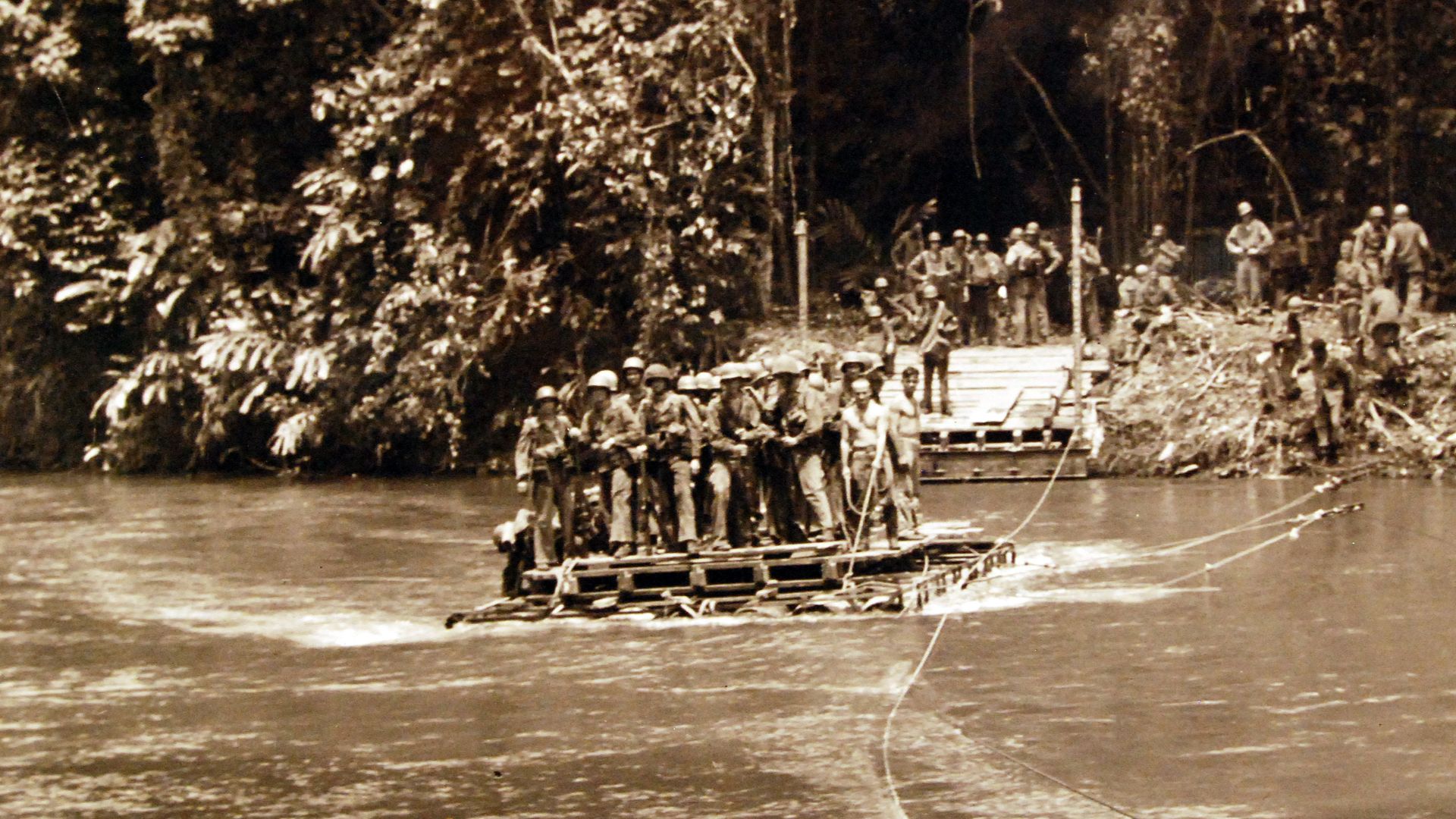 80-G-40267:  U.S. Marine engineers, on Guadalcanal Island during the Solomon Islands Campaign, use constructed rafts, 1942.  (2015/10/20).
