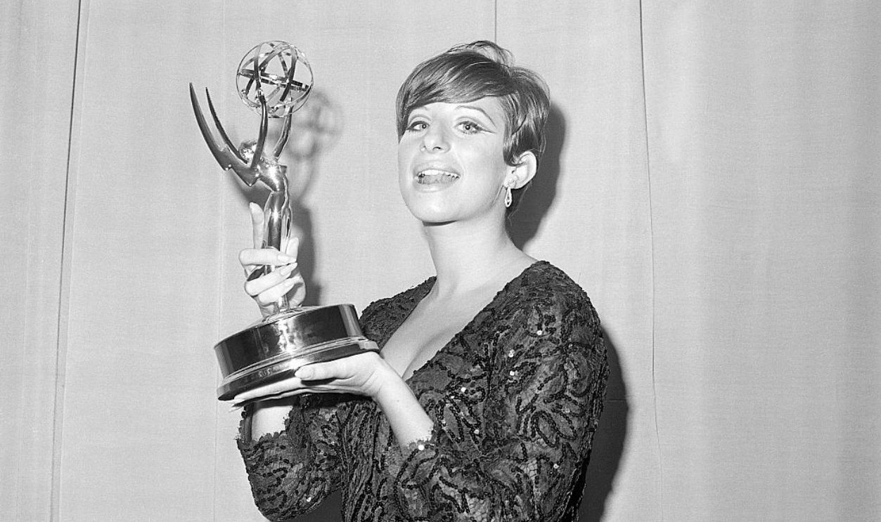 (Original Caption) 9/12/1965-A radiant Barbara Streisand is shown holding the Emmy award she won for outstanding achievement presented to her here late September 12 at television's Emmy Awards. Other top winners were Dick van Dyke, Lynn Fontaine and Leonard Bernstein. Filed 9/13/1965.