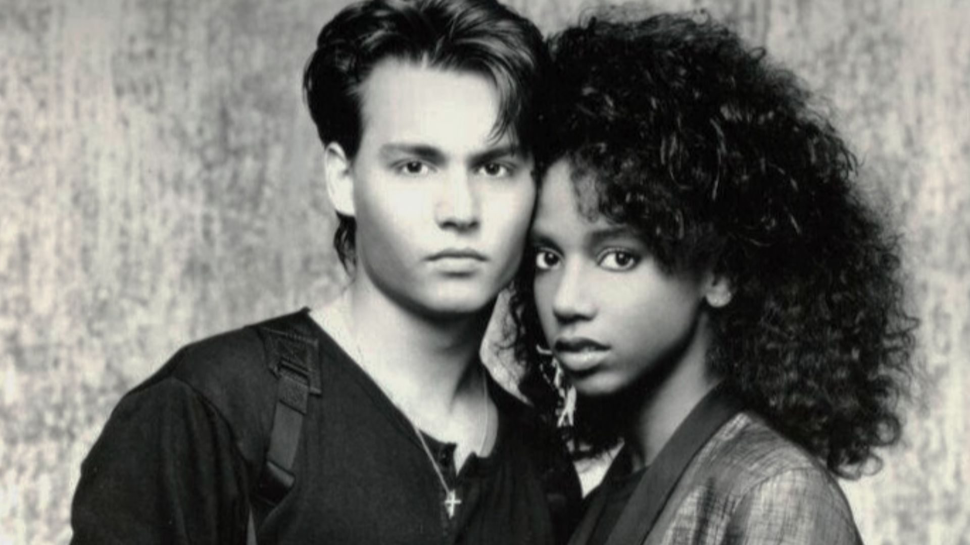 COOL SCHOOL COPS - Johnny Depp and Holly Robinson portray Officers Hanson and Hoffs as part of a special undercover police unit assigned to infiltrate circles of high school crime in the one-hour drama series 21 Jump Street Sundays (7-8 p.m. NYT) on Fox B