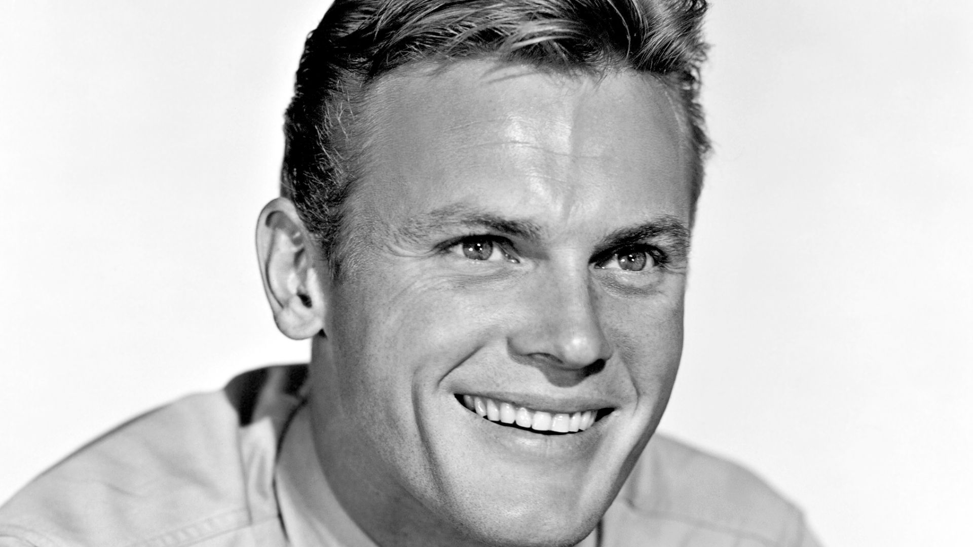 A promotional shot of Tab Hunter (1931 – 2018) in Battle Cry (1955)