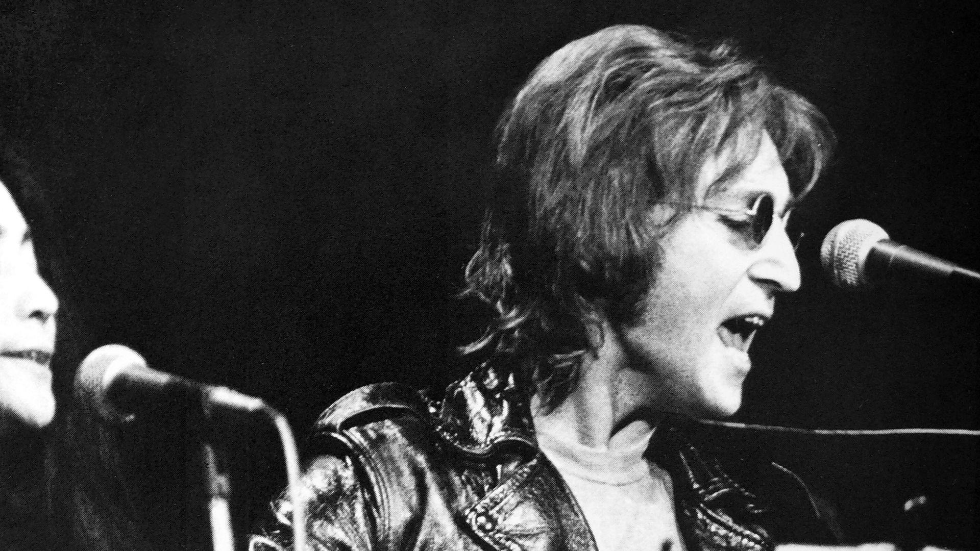 Yoko Ono and John Lennon at John Sinclair Freedom Rally at Crisler Arena in Ann Arbor, Michigan