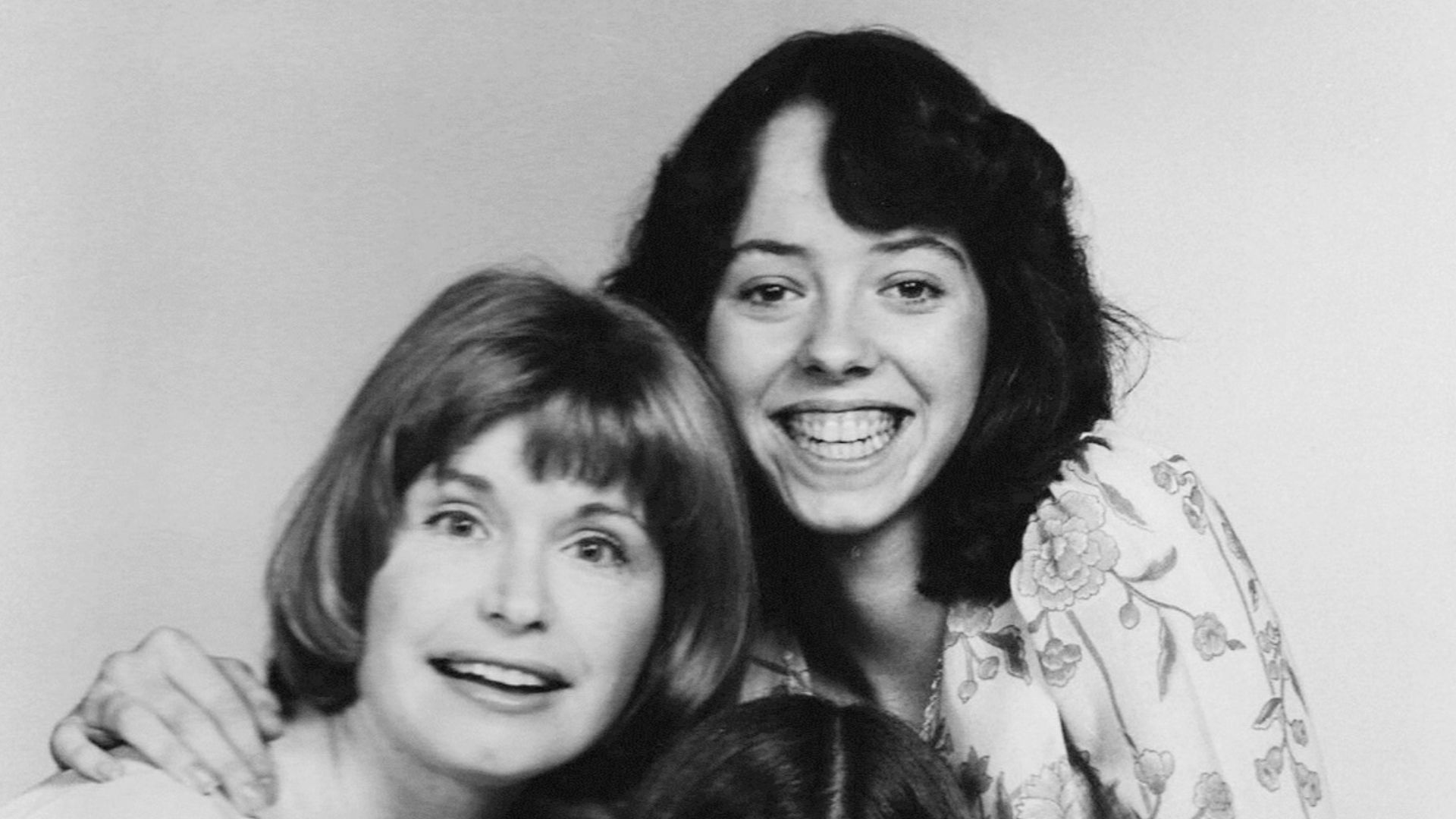 Photo of the female cast members of the television series One Day at a Time.  Clockwise from left: Bonnie Franklin (Ann Romano), Mackenzie Phillips (Julie Cooper), and Valerie Bertinelli (Barbara Cooper).