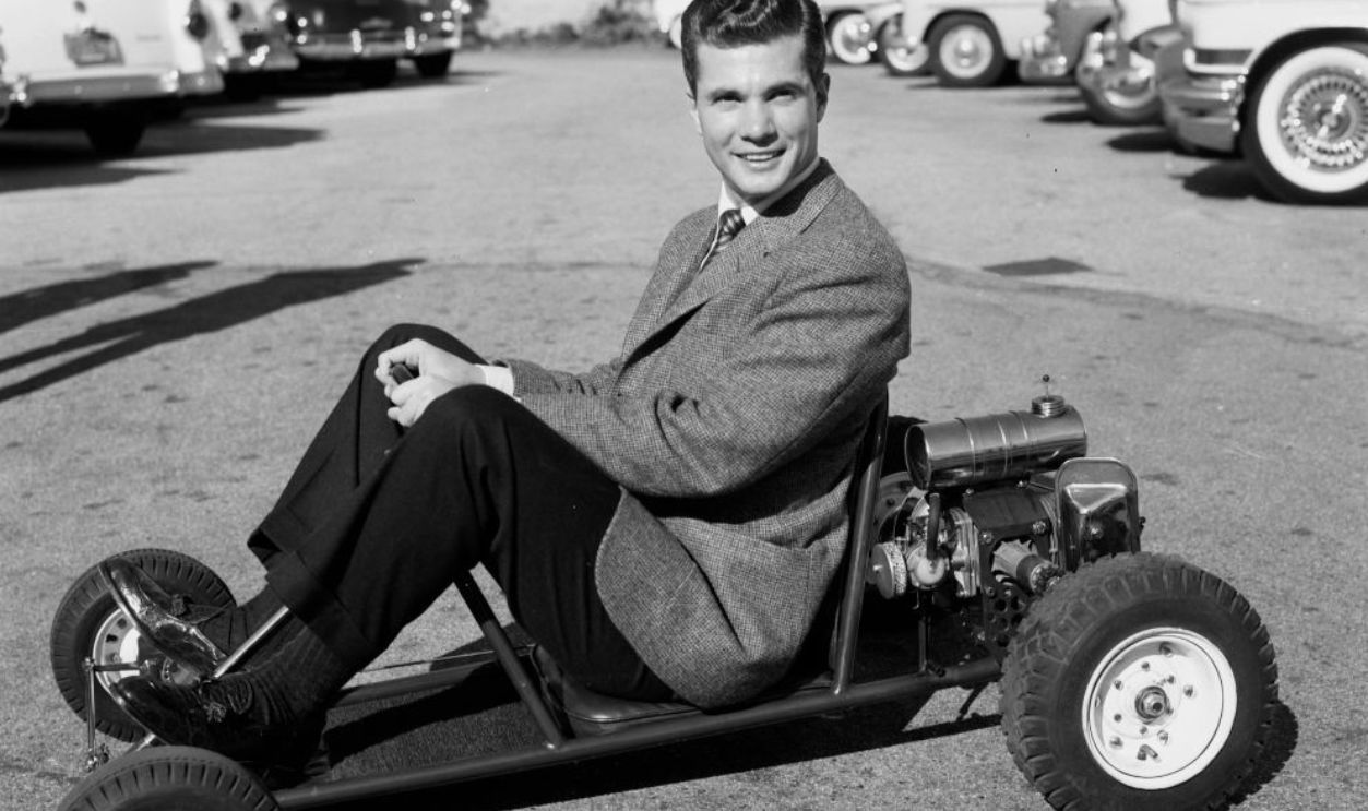 LOS ANGELES - CIRCA 1957 : Actor Dwayne Hickman pose as he drives a scooter in Los Angeles, California. 