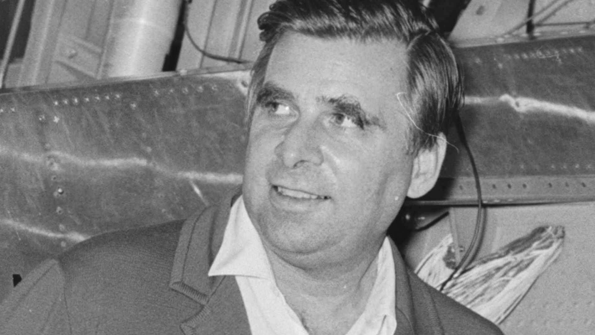 Gene Roddenberry receive briefing on NASA Dryden Flight Research Center, now Armstrong, in front of HL-10