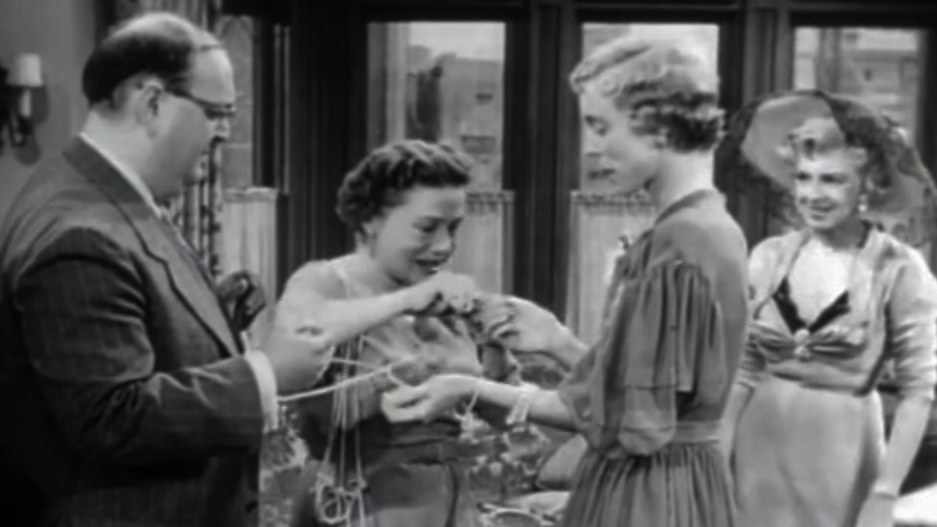 L. to R. : Zero Mostel, Thelma Ritter, Nancy Kulp & Dennie Moore, in The Model and the Marriage Broker - trailer (cropped screenshot)