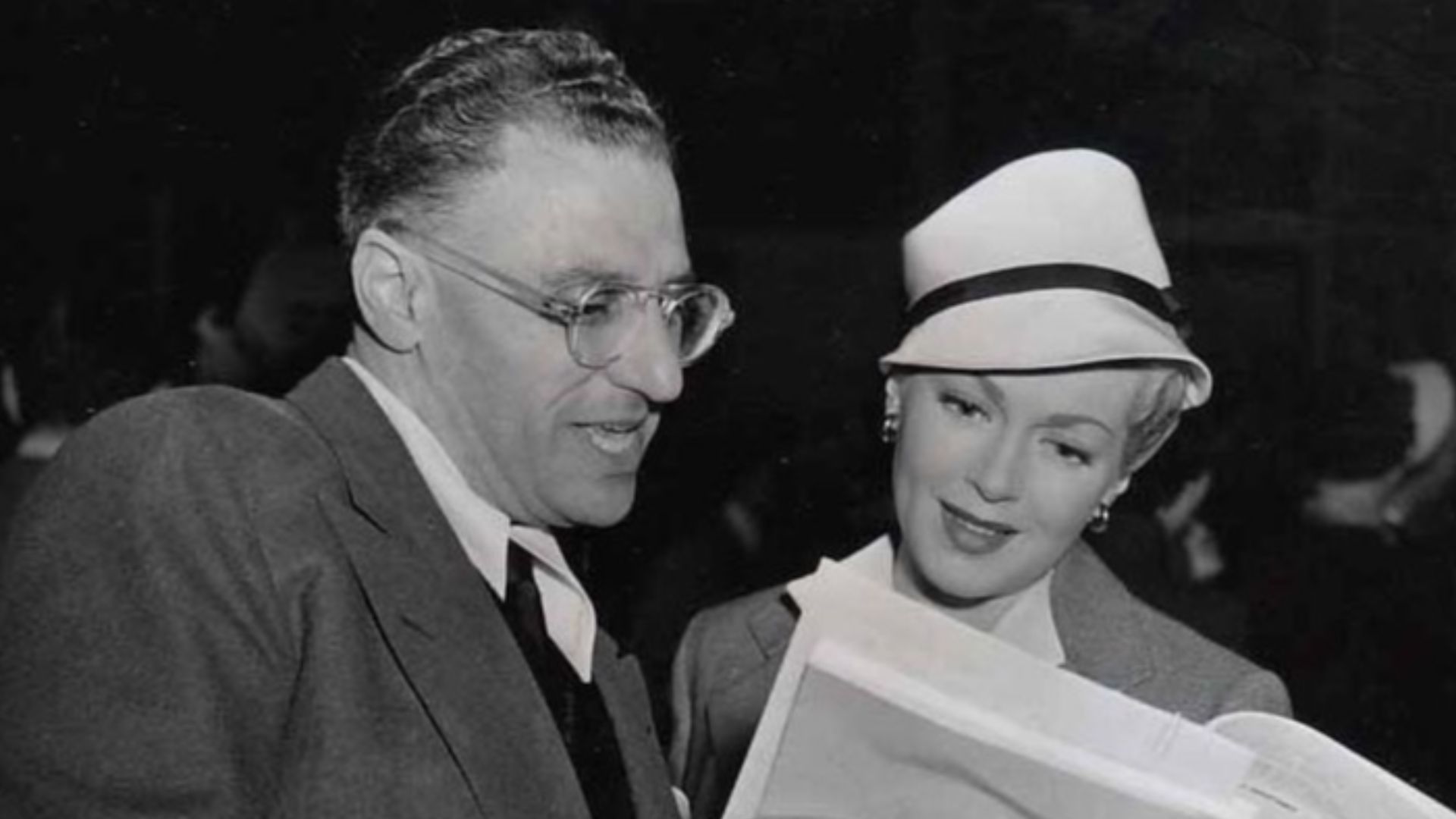 Lana Turner and George Cukor, 1950, reading the script on set of The Bad and the Beautiful