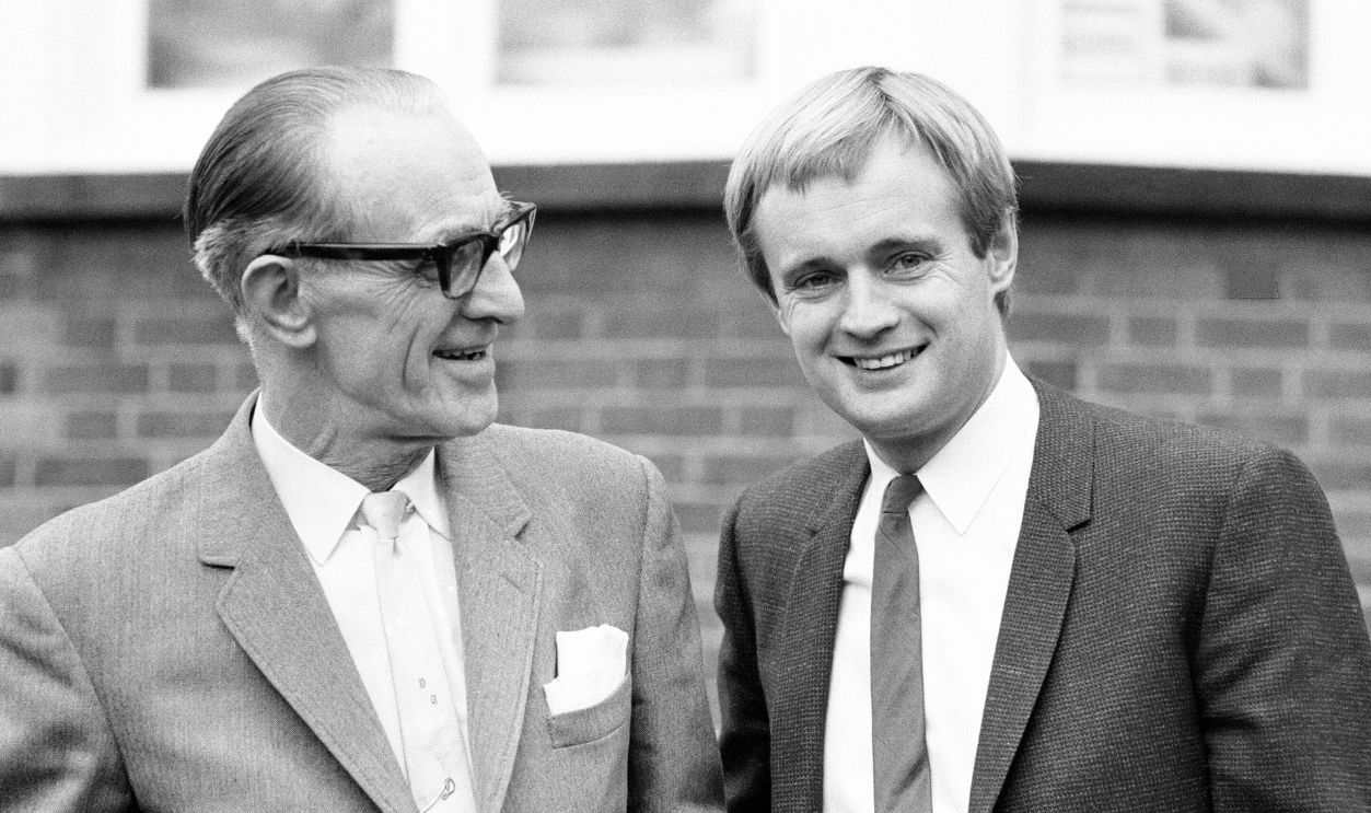 David McCallum, actor who plays the role of secret agent Illya Kuryakin in NBC show The Man from 'UNCLE', pictured at home of parents in Hampstead, London, 16th March 1966. UK Promotion Tour. Standing with father David Snr.