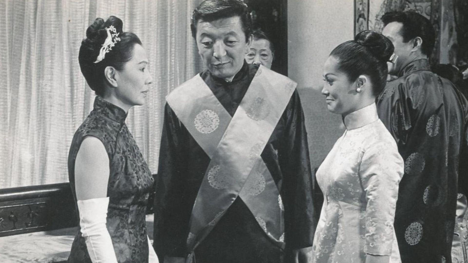 Press photo of (from left to right) Soo Yong, Jack Soo and Nancy Kwan, for the 1961 film Flower Drum Song.