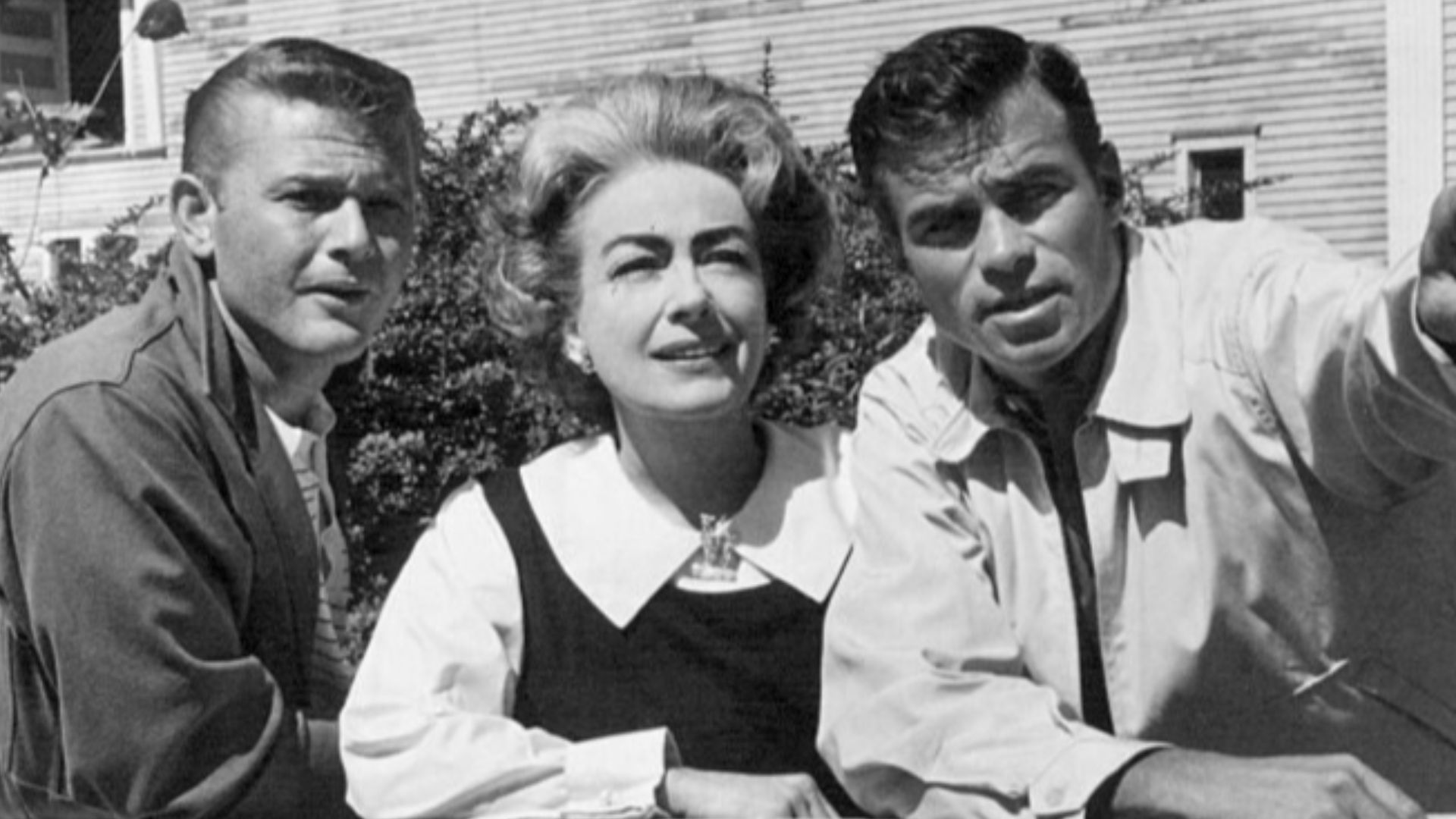 Photo of Martin Milner and Glenn Corbett with guest star Joan Crawford from an episode of Route 66.