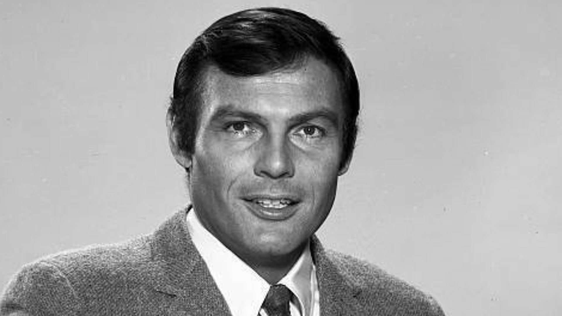 Photo of Adam West in 1967 as Bruce Wayne from the television program Batman.