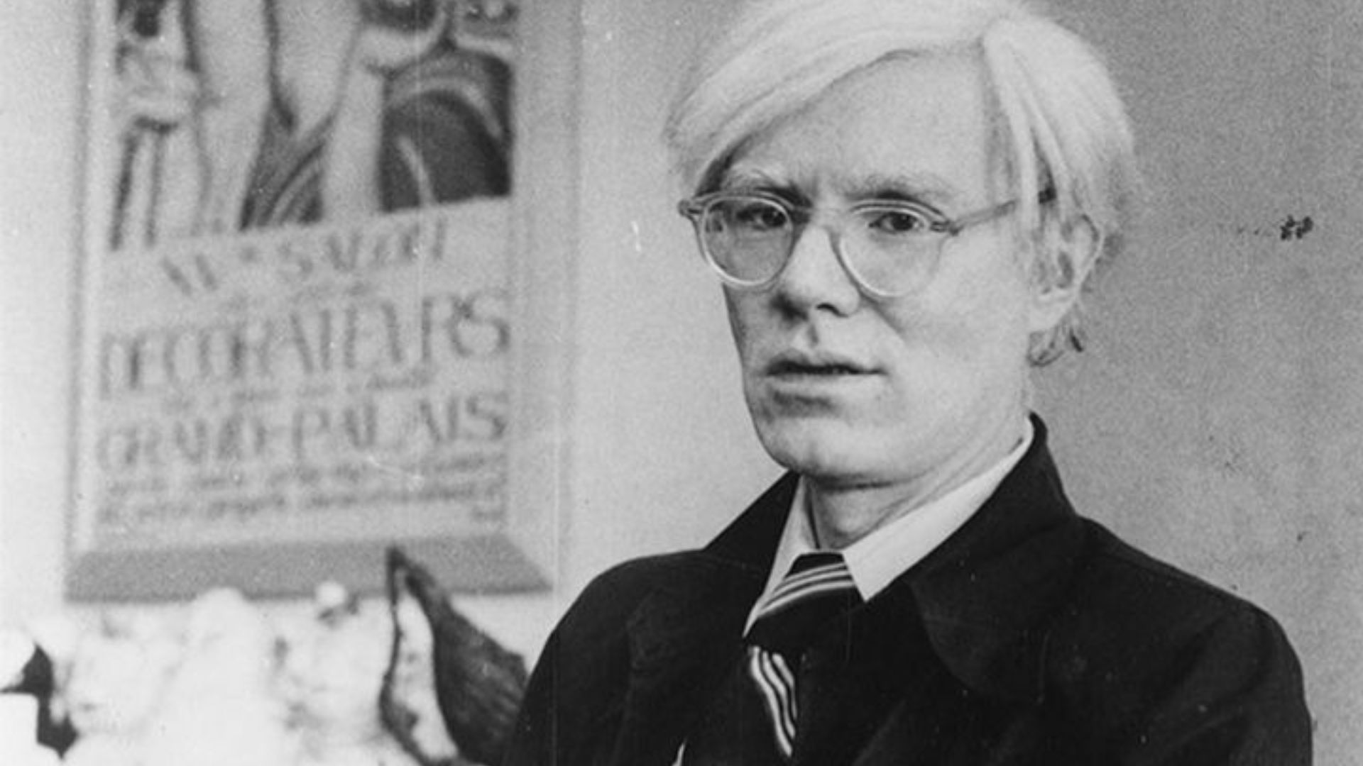 Andy Warhol and his dachshund Archie at his New York studio, the Factory