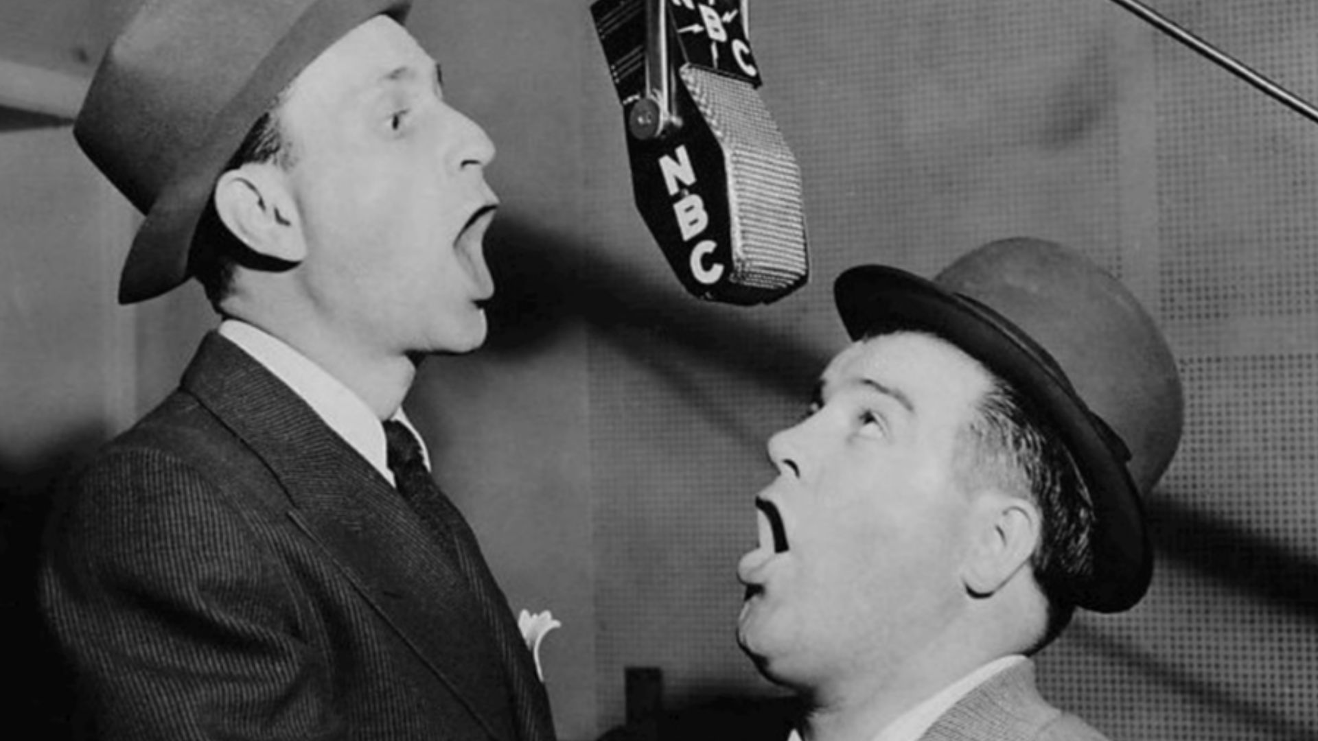 Photo of Bud Abbott and Lou Costello in the NBC radio studios.