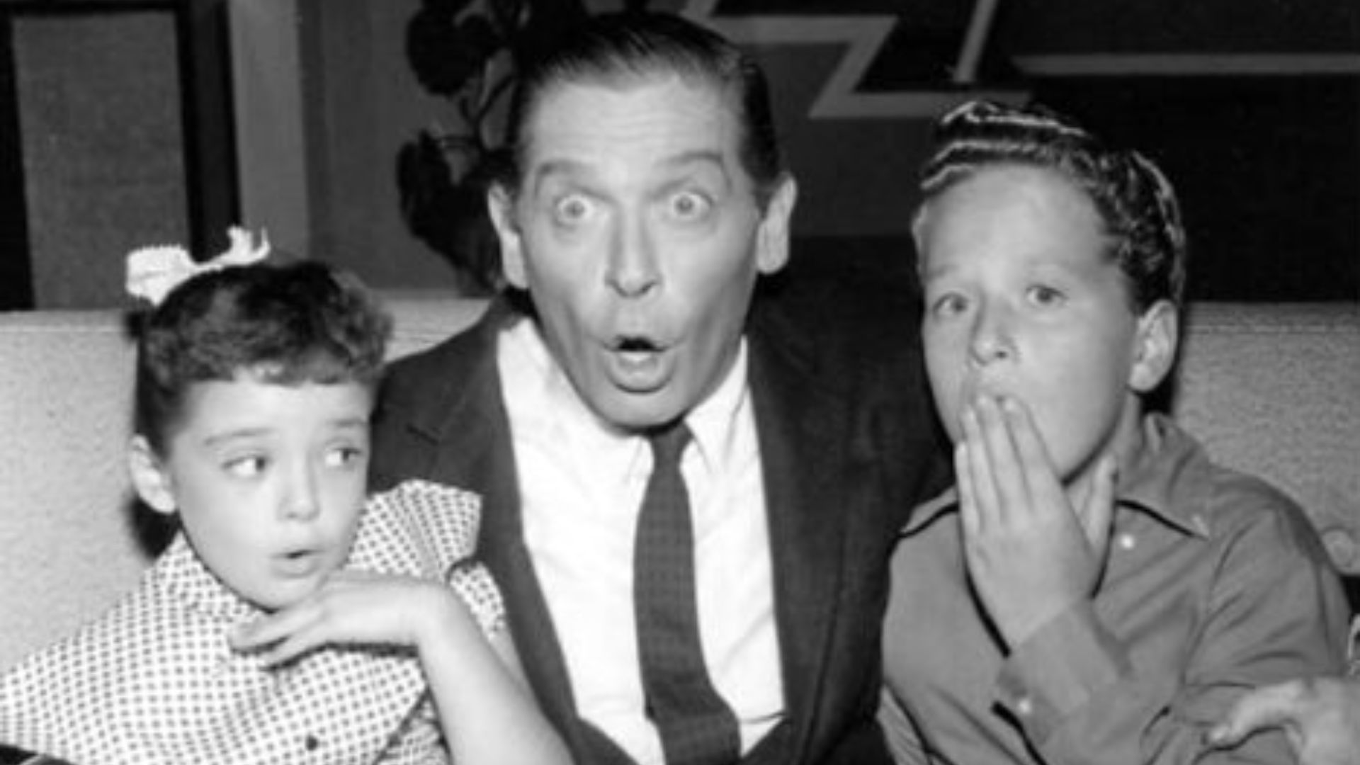 Publicity photo of Milton Berle with Angela Cartwright and Rusty Hamer from the television program Make Room for Daddy.
