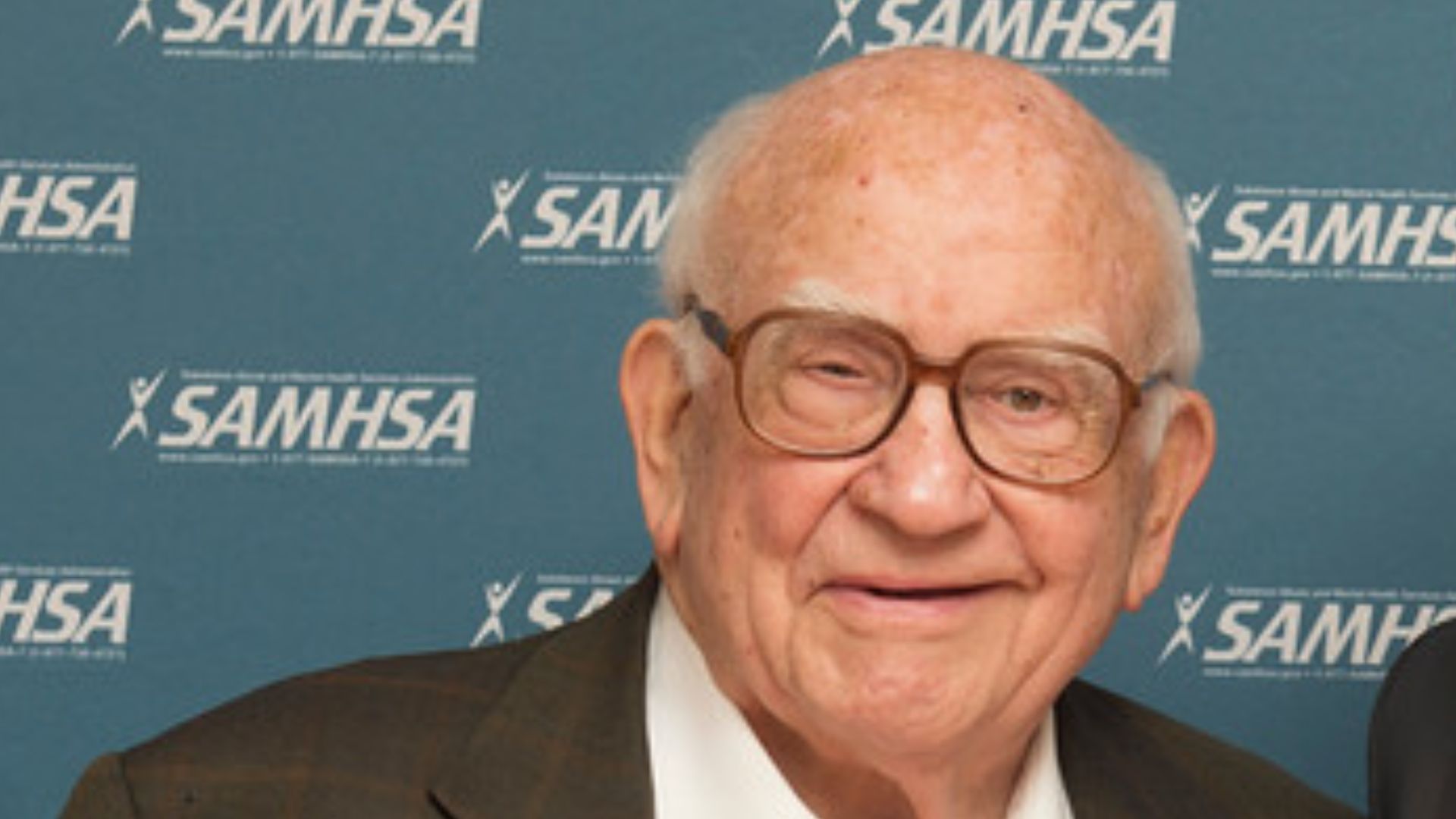 Actor Ed Asner stands with writer Jeff King who accepted a Voice Award on behalf of his tv show, Elementary.