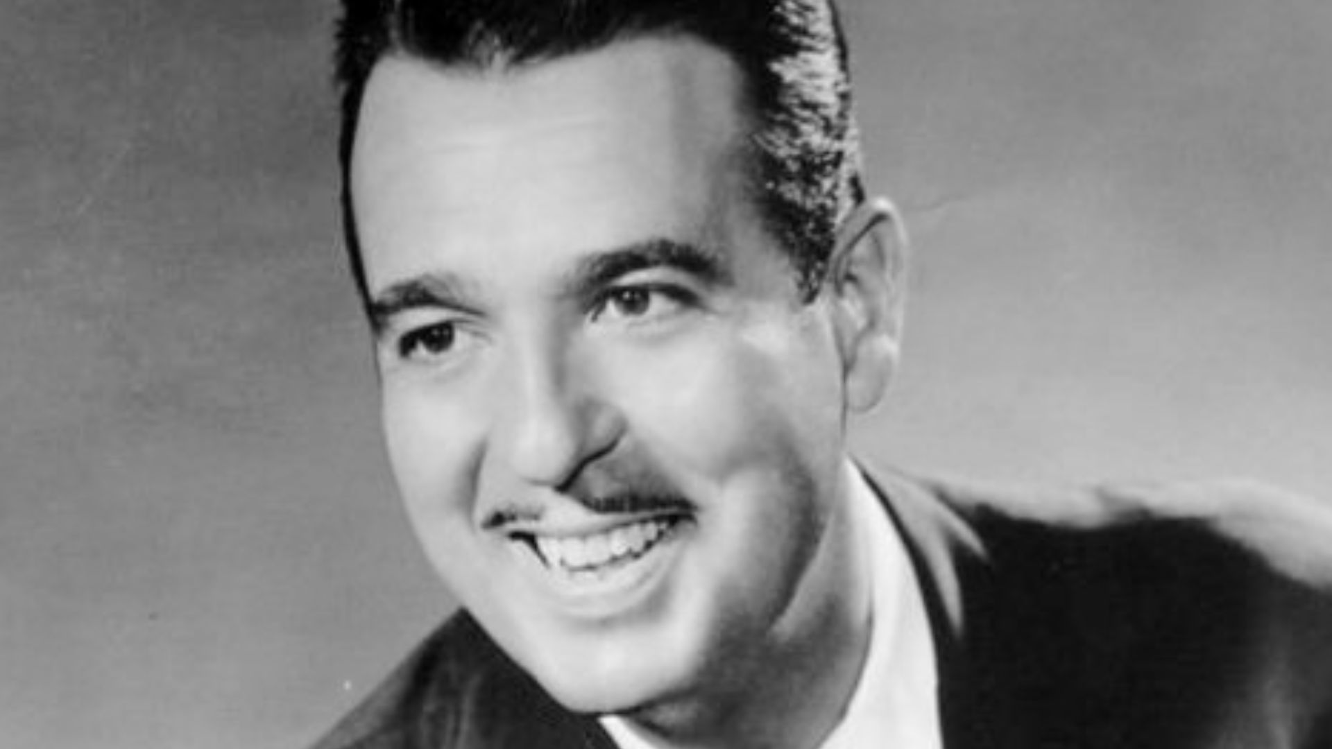Publicity photo of Tennessee Ernie Ford from the television program The Ford Show.