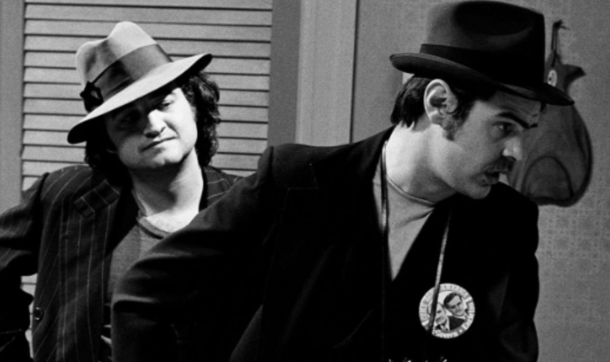 SATURDAY NIGHT LIVE -- Episode 14 -- Air Date 02/21/1976 -- Pictured: (l-r) John Belushi as Rico, Dan Aykroyd as Eliot Ness during