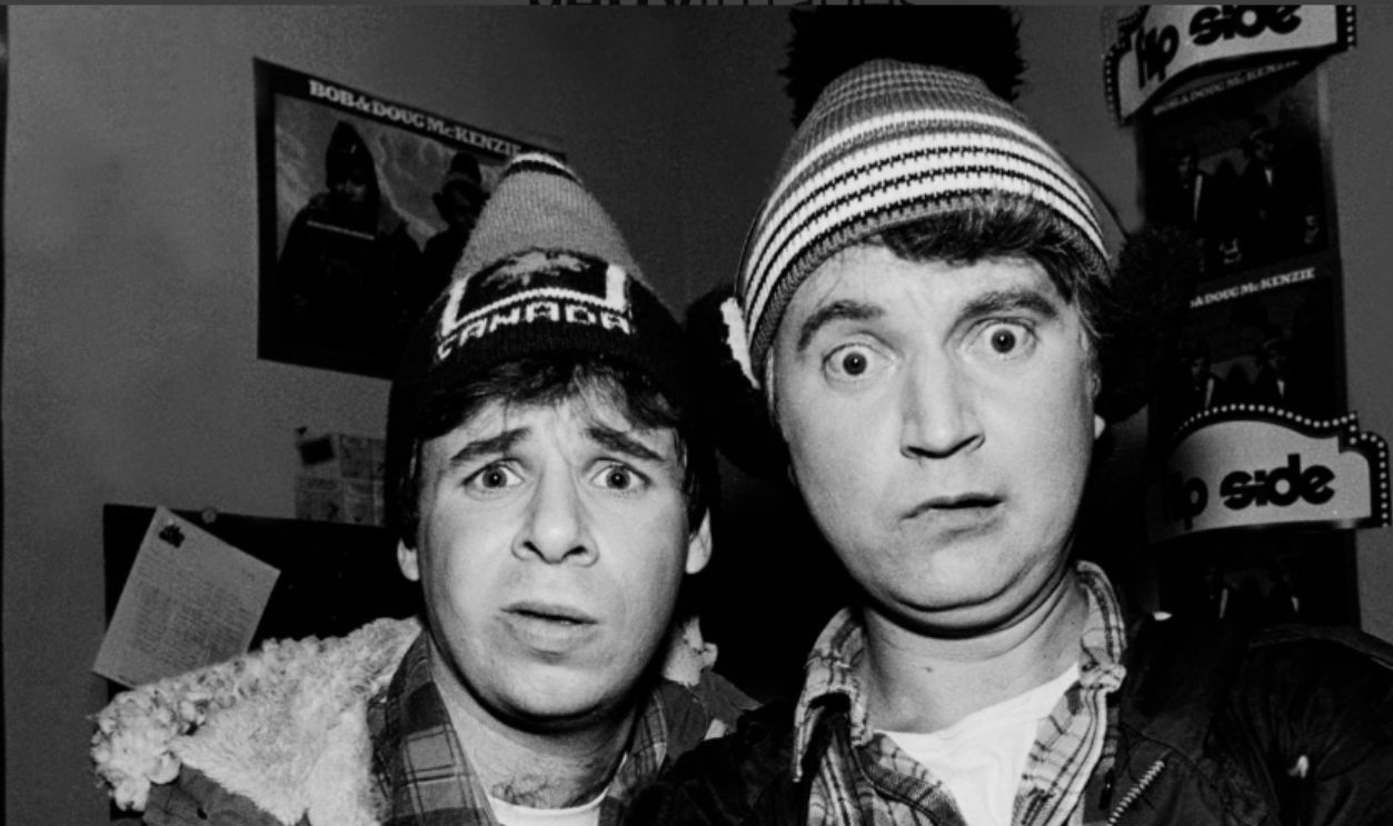 Bob McKenzie, played by Rick Moranis, and his brother Doug, played by Dave Thomas, appear at Flip Side Records in Chicago, Illinois, January 14, 1982.