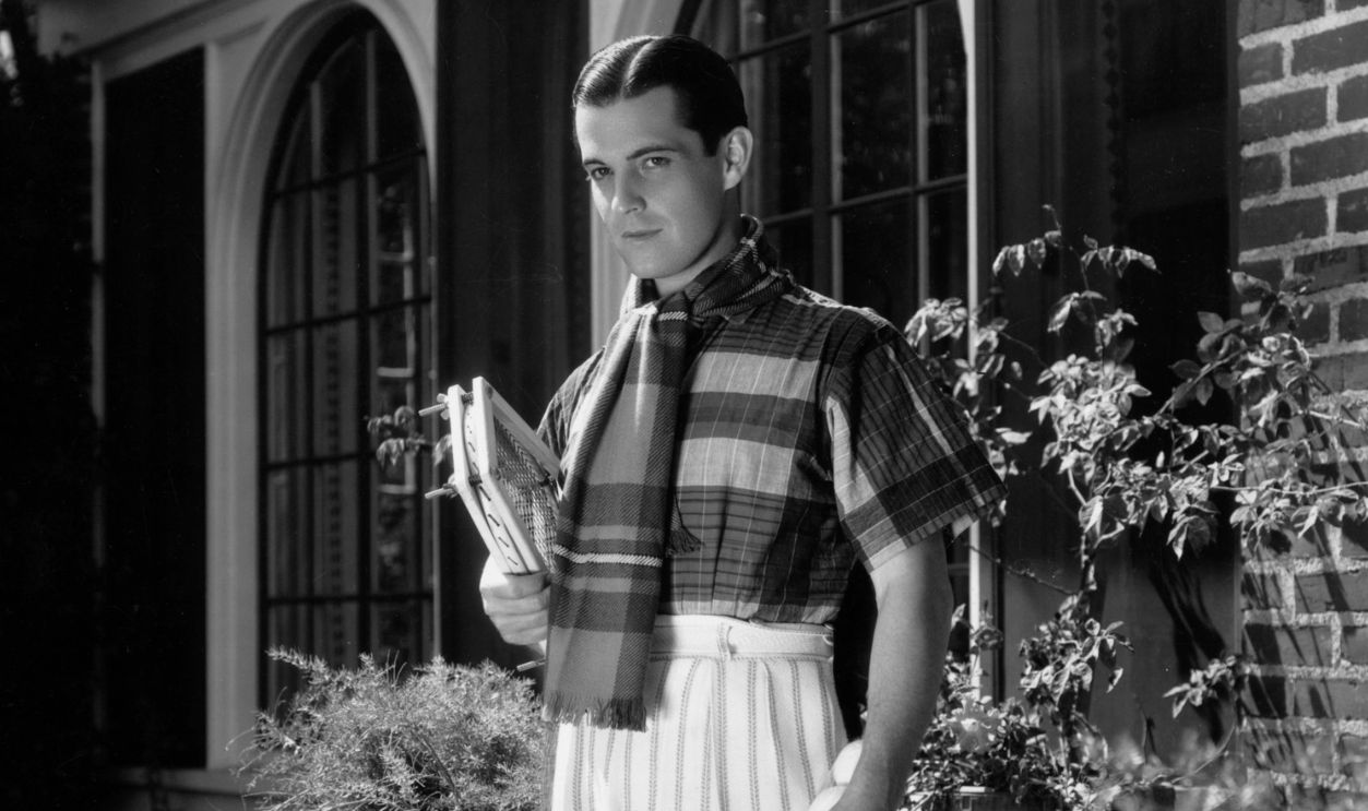 Mexican film star Ramon Novarro (1898 - 1968), the stage name of Ramon Samaniegos, ready for a game of tennis.