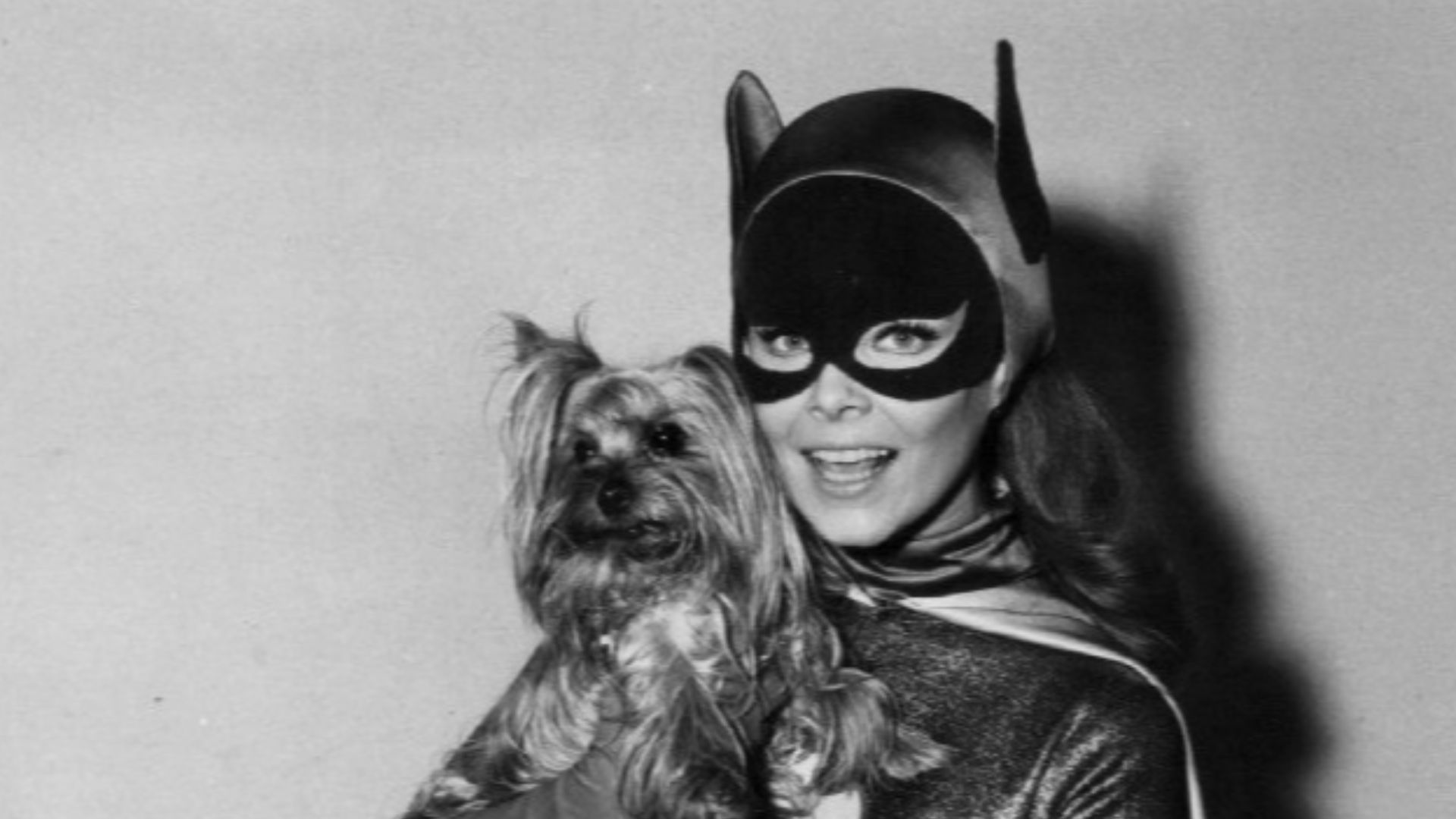 Photo of Yvonne Craig as Batgirl on the Batman set with her Yorkie, Sebastian.