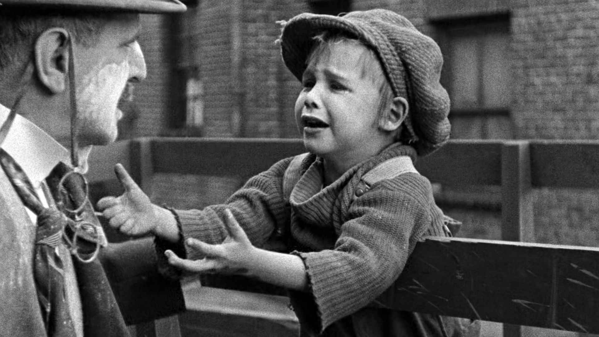 Frank Campeau (the man) and Jackie Coogan (child) in The Kid (1921).