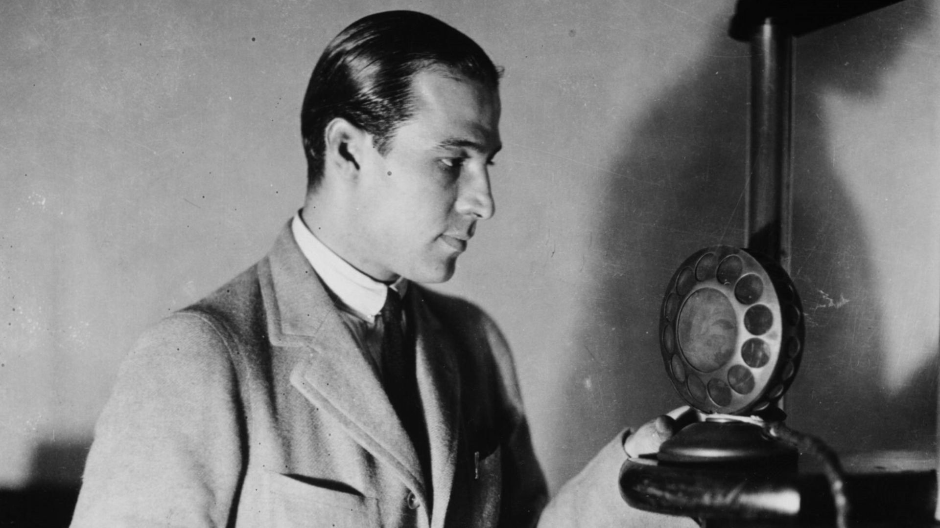Rudolph Valentino participating in a broadcast on WSB radio in Atlanta, Georgia in 1923