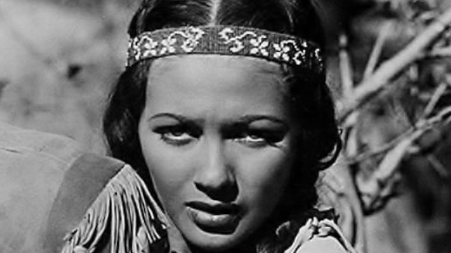 Cropped photo of Canadian actress Yvonne De Carlo playing Wah-Tah, her first credited role in a feature film, in Deerslayer (1943).