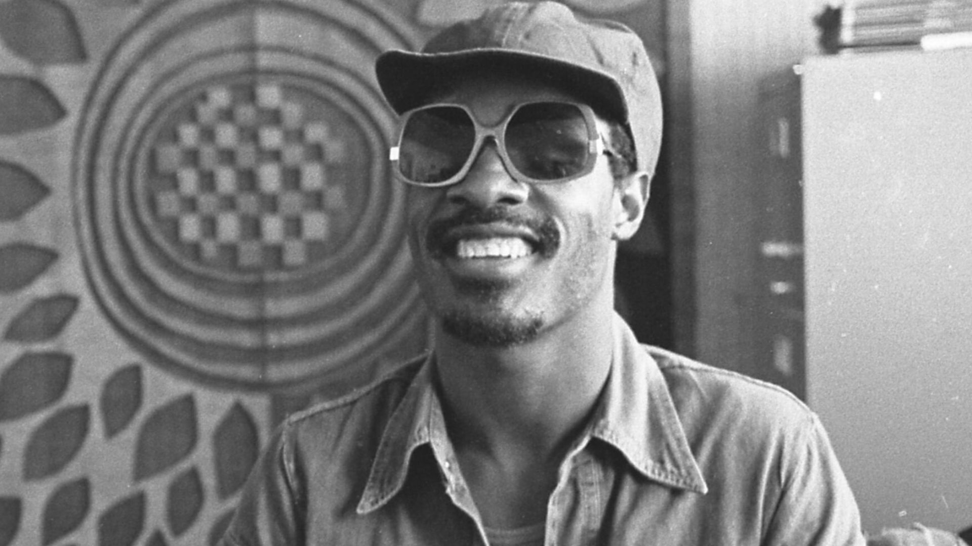 Musician Stevie Wonder with music executive Ewart Abner in Los Angeles, Calif.,