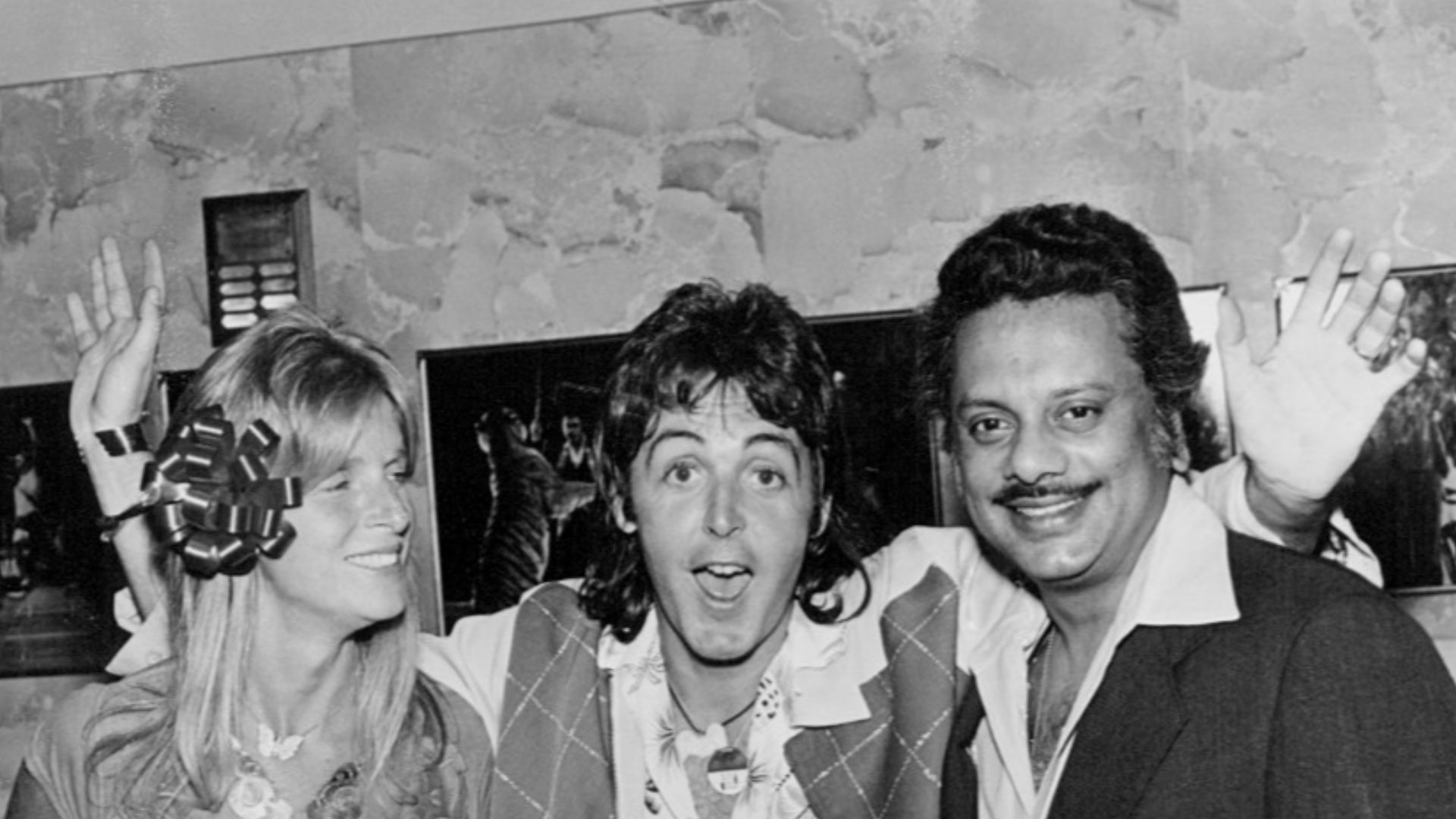 Photo of Paul and Linda McCartney with Bhaskar Menon, president of Capitol Records.  The photo was taken at the Los Angeles Forum Club during the 1976 Wings Over America tour.