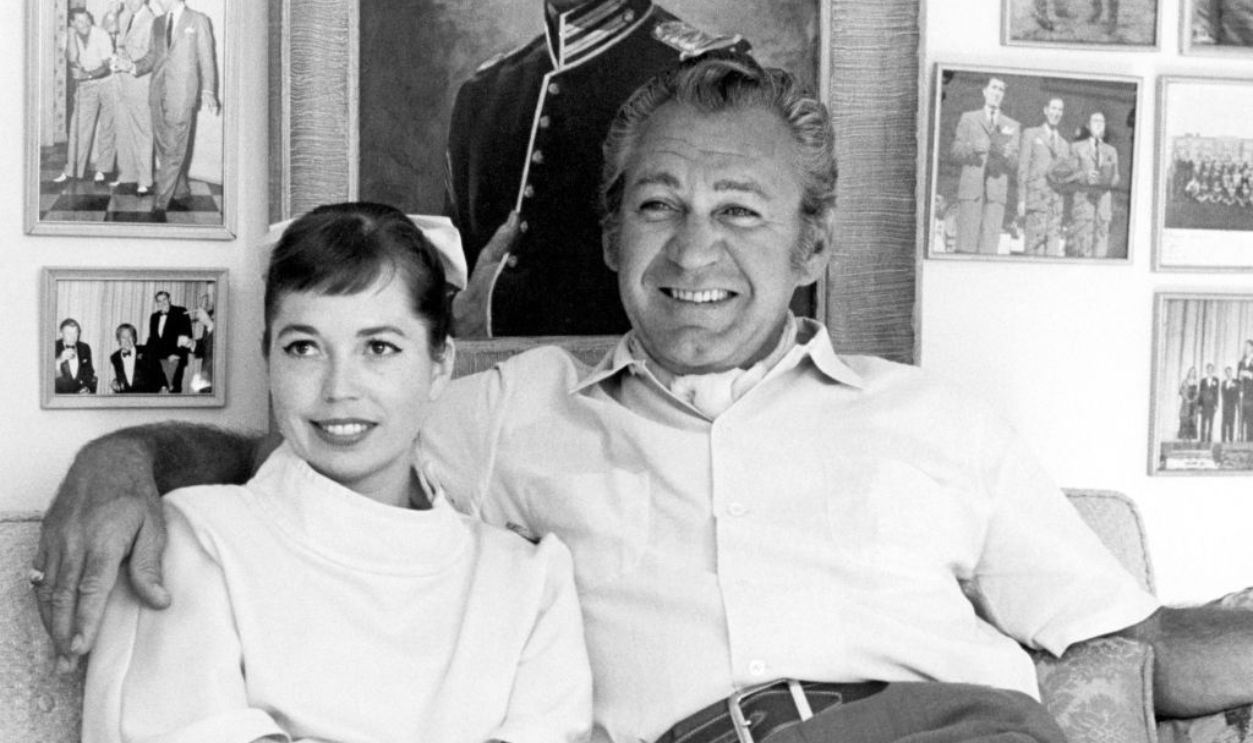 LOS ANGELES, CA - 1967: American actor in both movies and television Forrest Tucker (1919-1986) and his wife, actress Marilyn Fisk pose for a portrait in their home circa 1967 in Los Angeles, California.